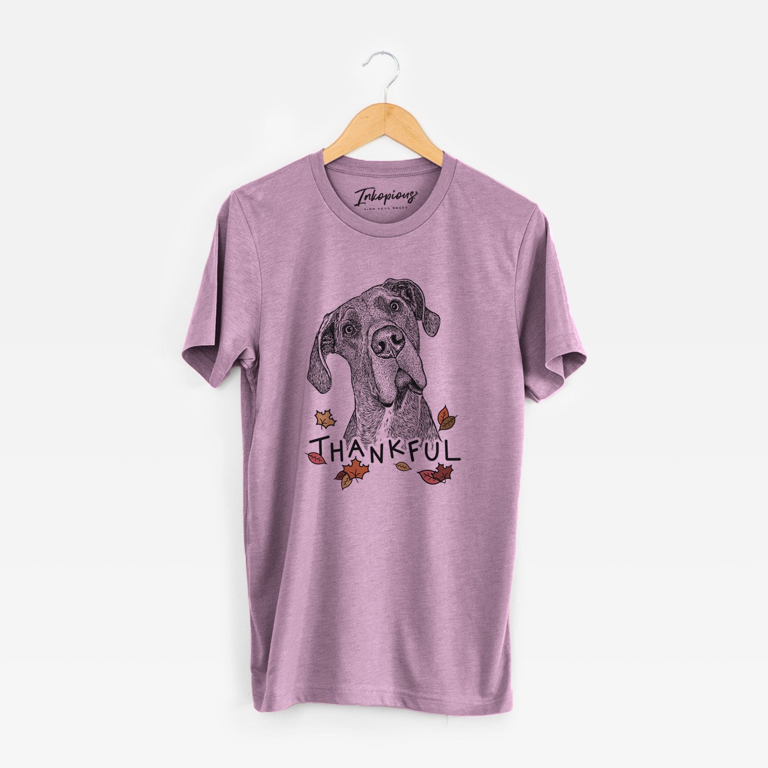 Hand-drawn sketch of River the Great Dane with 'Thankful' lettering and autumn leaves on an Orchid Unisex crewneck