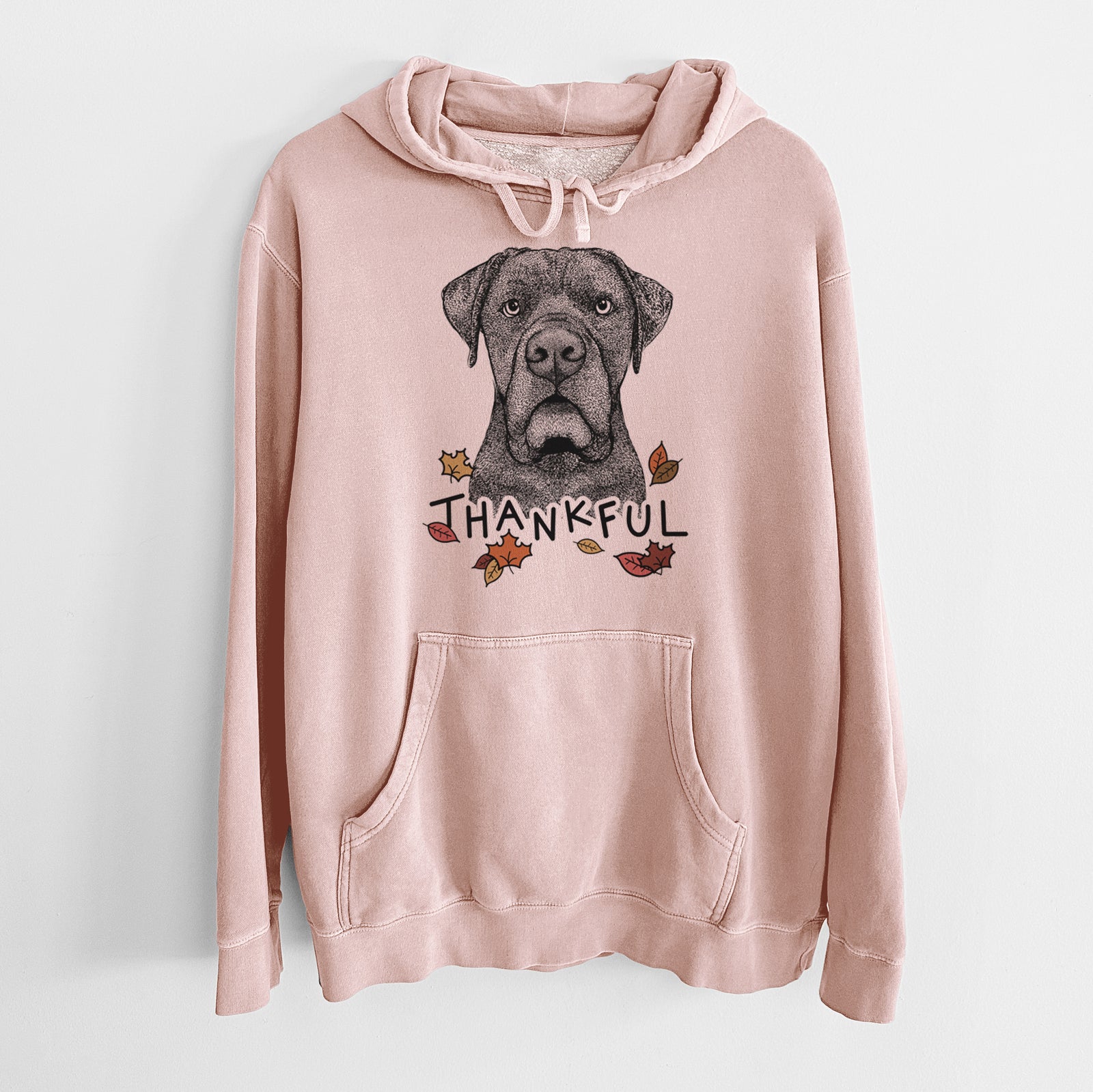 Hand-drawn sketch of Rocco the Cane Corso with 'Thankful' lettering and autumn leaves on a Dusty Pink Unisex pigment dyed hoodie