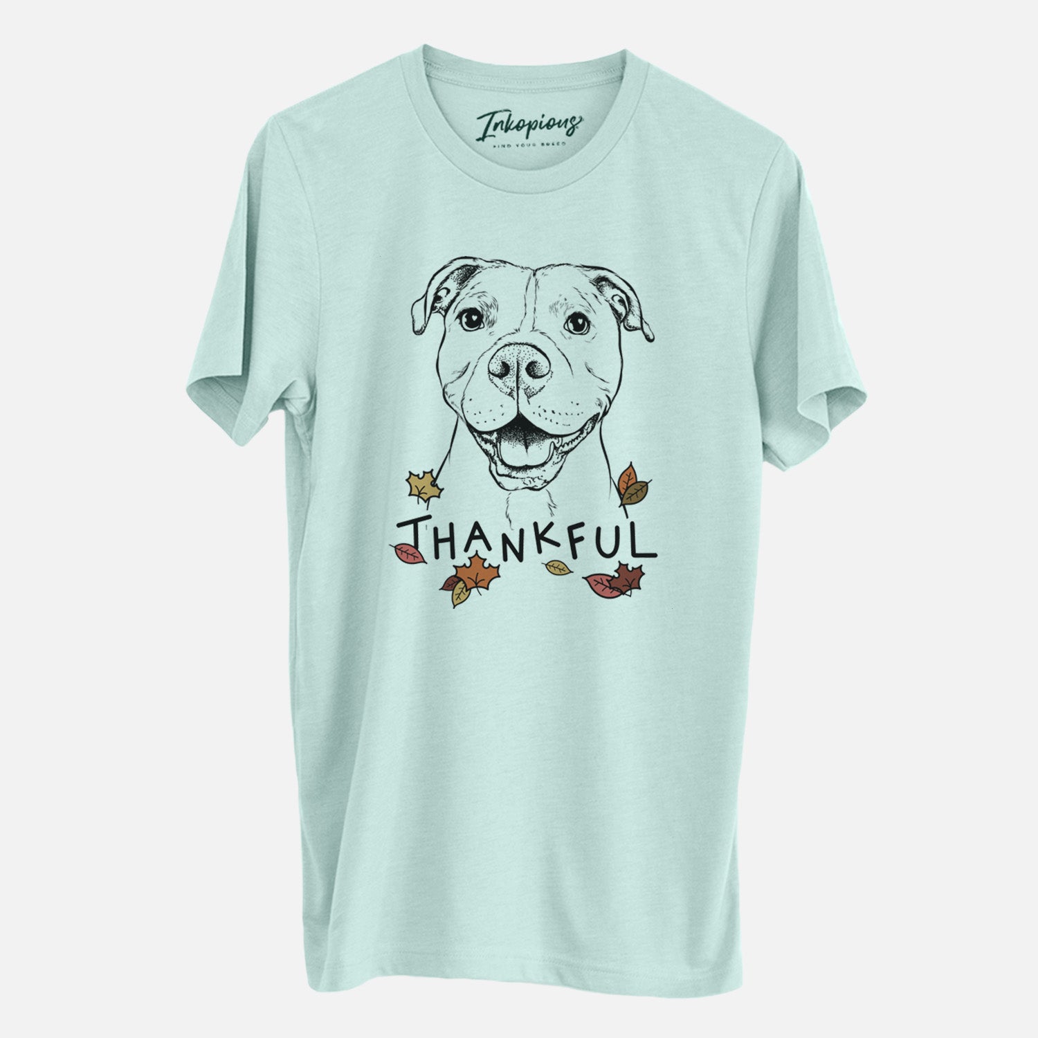 Hand-drawn sketch of Roscoe the Pitbull with 'Thankful' lettering and autumn leaves on a Heather Sage Unisex crewneck
