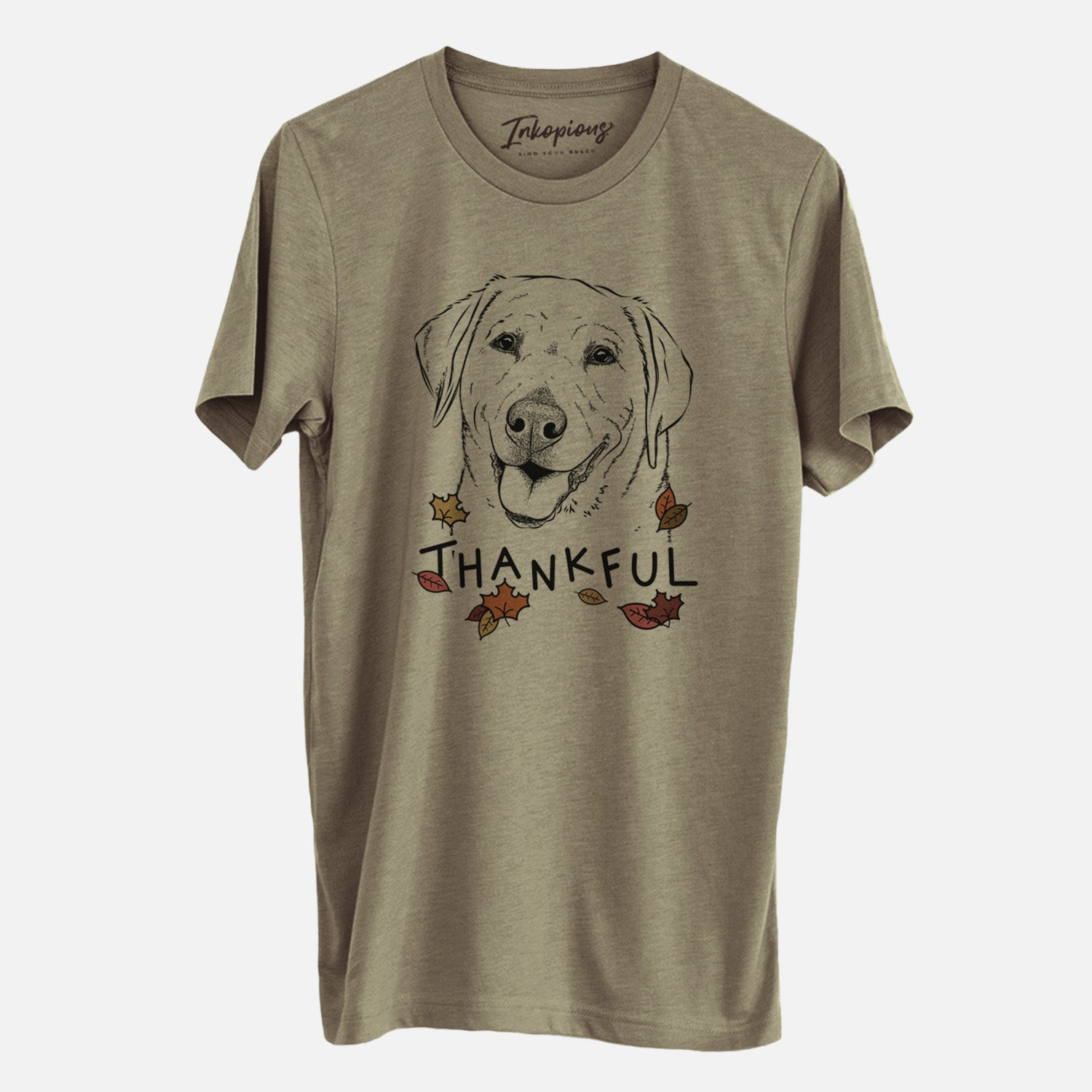 Hand-drawn sketch of Sanford the Labrador Retriever with 'Thankful' lettering and autumn leaves on an Olive Unisex crewneck