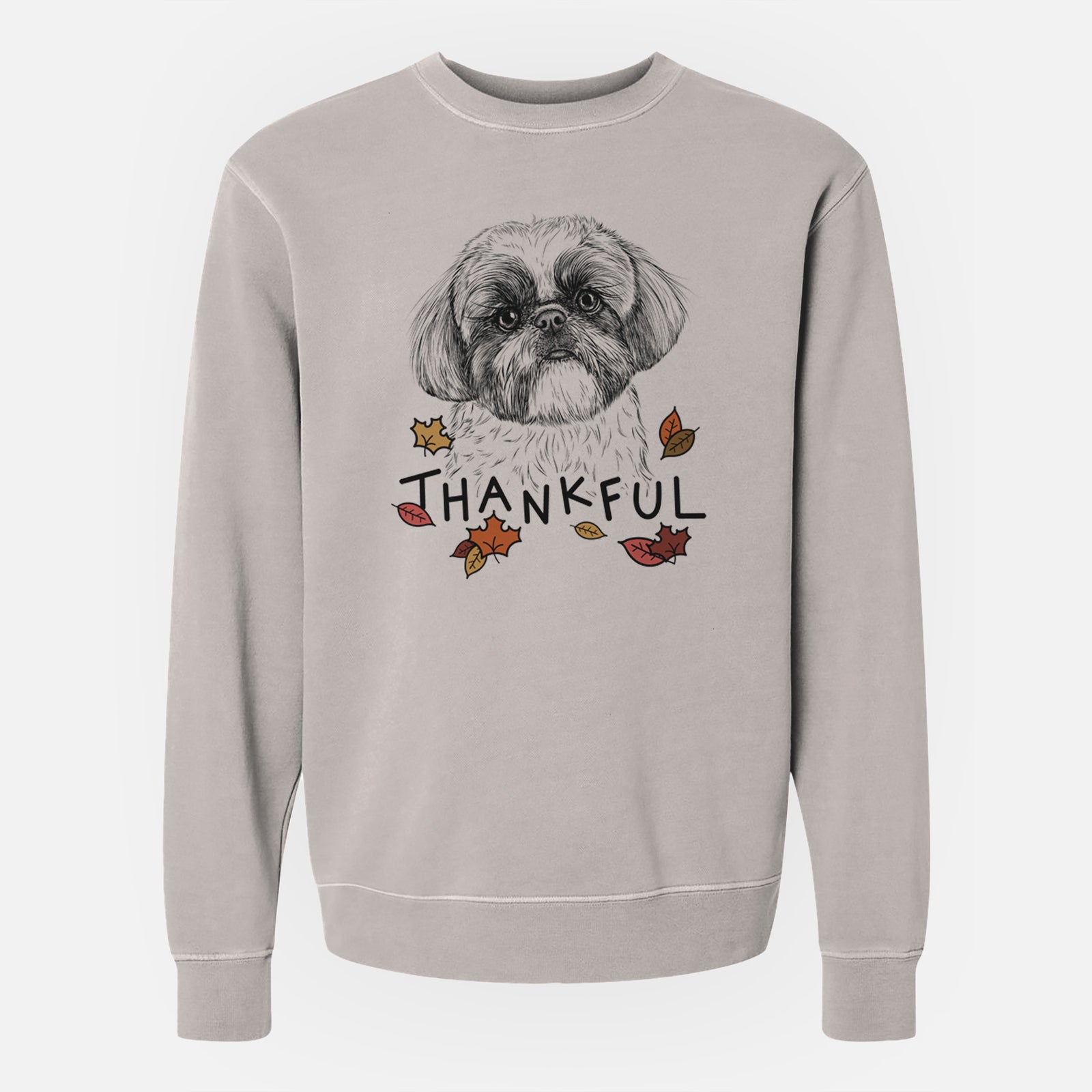 Hand-drawn sketch of Simon the Shih Tzu with 'Thankful' lettering and autumn leaves on a Cement Unisex pigment dyed crew sweatshirt