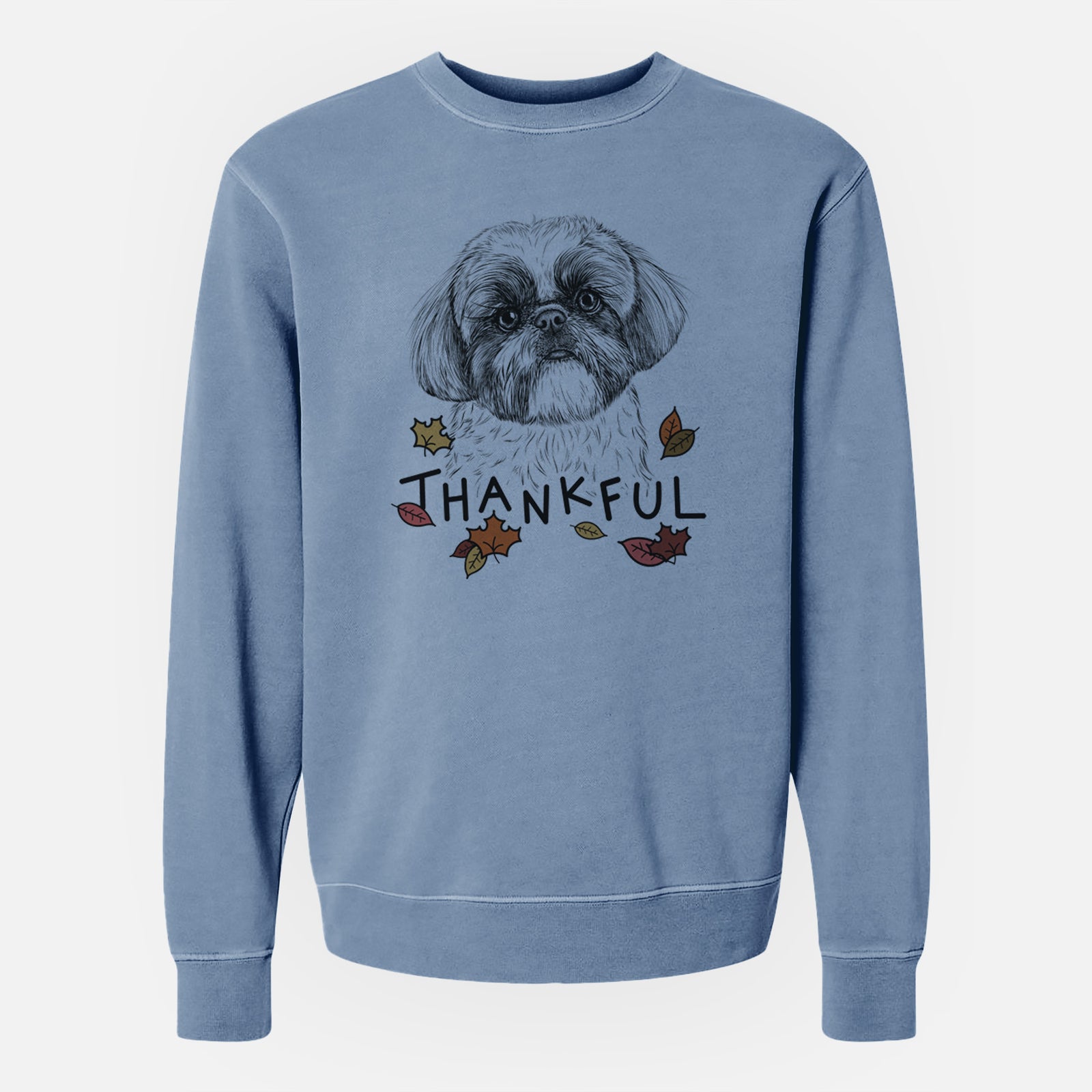 Hand-drawn sketch of Simon the Shih Tzu with 'Thankful' lettering and autumn leaves on a Slate Blue Unisex pigment dyed crew sweatshirt