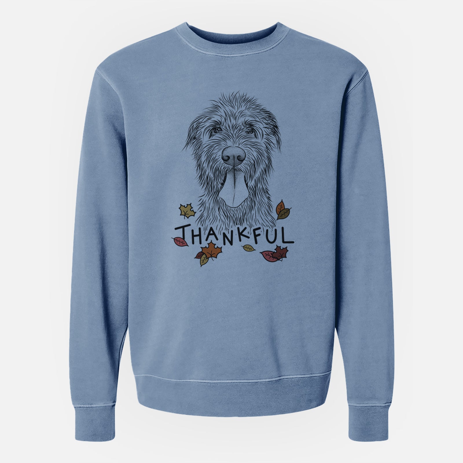 Hand-drawn sketch of Sullivan the Irish Wolfhound with 'Thankful' lettering and autumn leaves on a Slate Blue Unisex pigment dyed crew sweatshirt