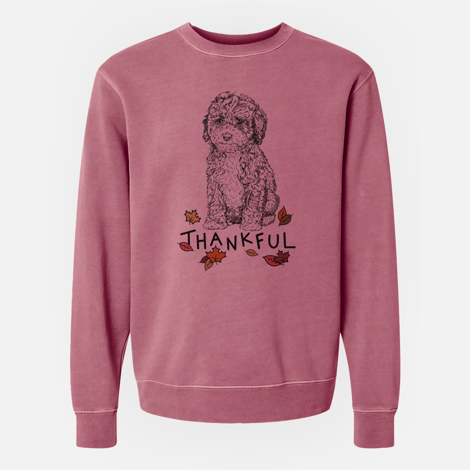 Hand-drawn sketch of Sweet Tea the Mini Doodle with 'Thankful' lettering and autumn leaves on a Maroon Unisex pigment dyed crew sweatshirt