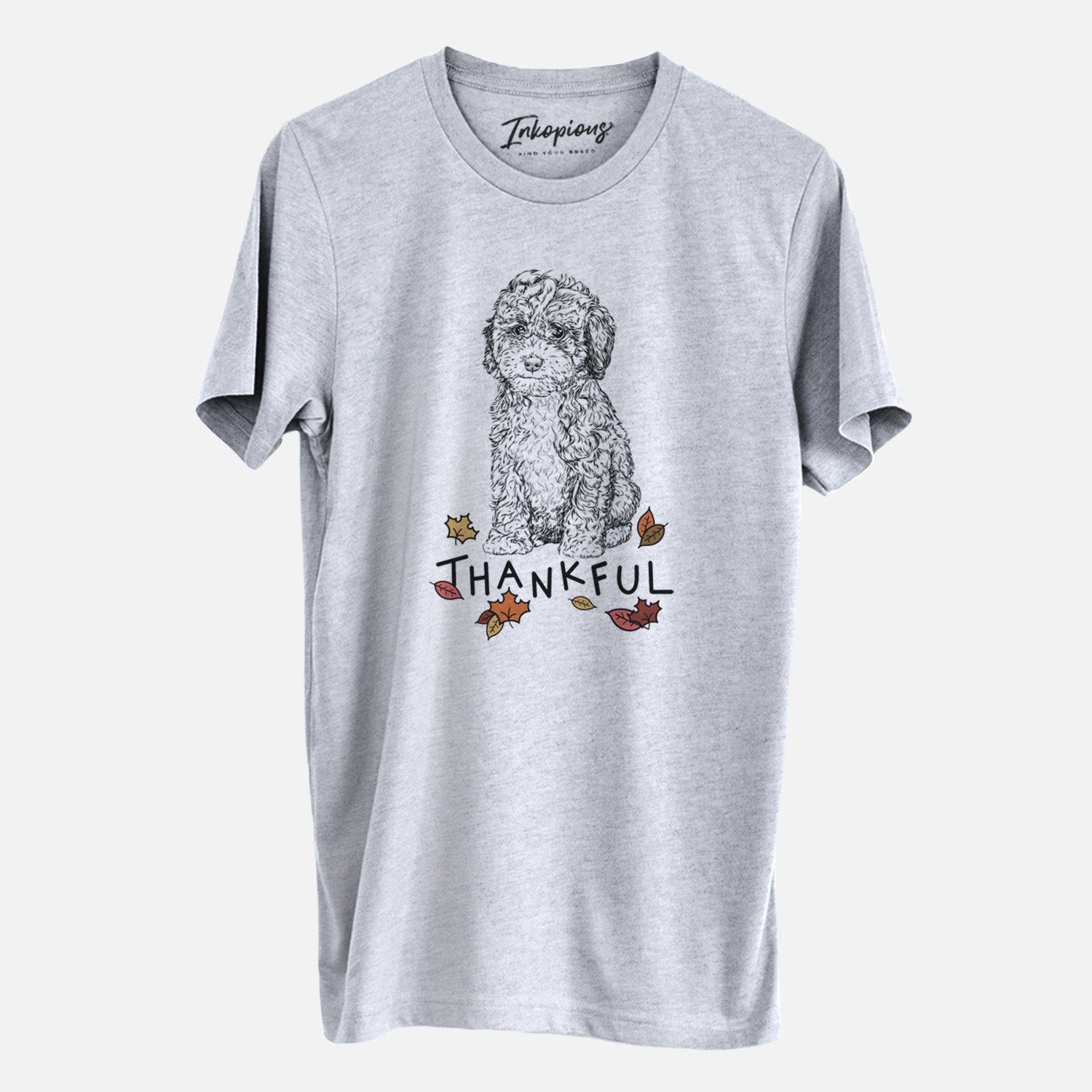 Hand-drawn sketch of Sweet Tea the Mini Doodle with 'Thankful' lettering and autumn leaves on a Grey Unisex crewneck