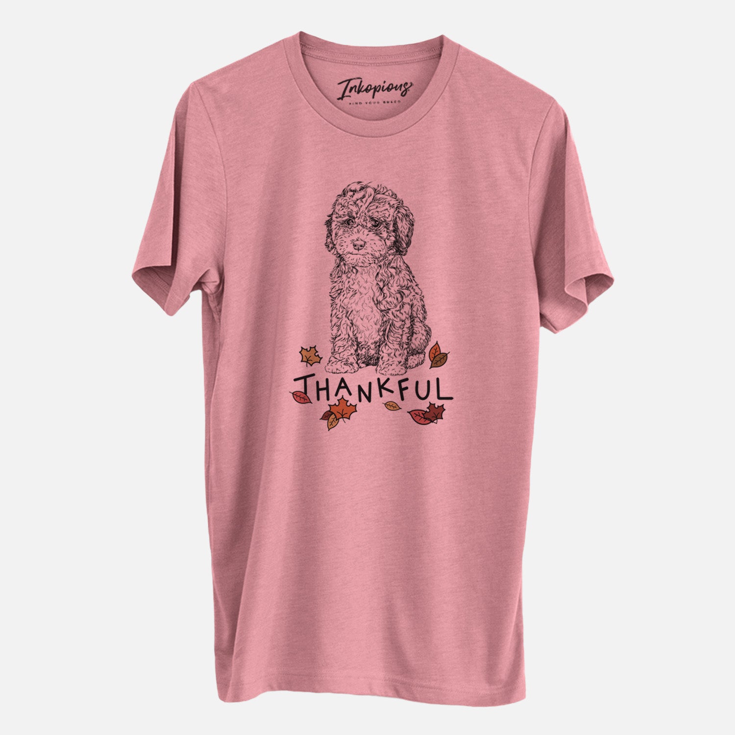 Hand-drawn sketch of Sweet Tea the Mini Doodle with 'Thankful' lettering and autumn leaves on a Mauve Unisex crewneck