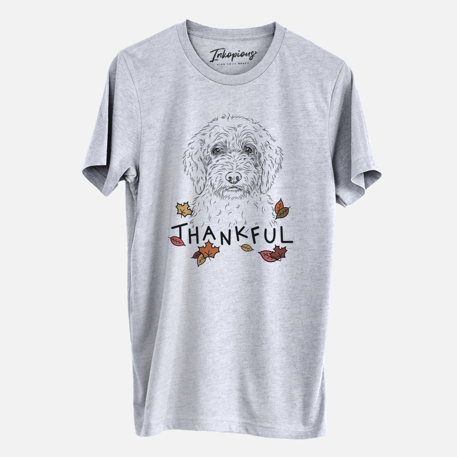 Hand-drawn sketch of Teddy the Labradoodle with 'Thankful' lettering and autumn leaves on a Grey Unisex crewneck