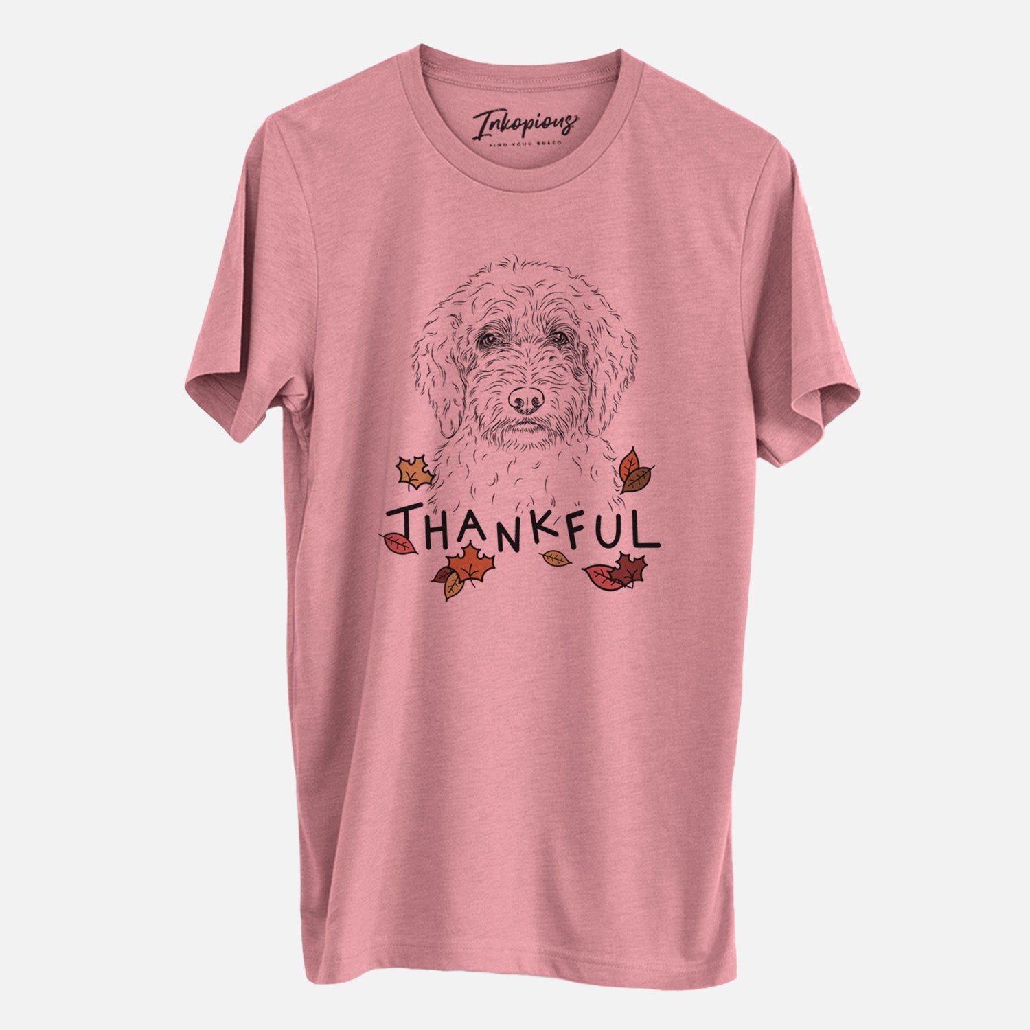 Hand-drawn sketch of Teddy the Labradoodle with 'Thankful' lettering and autumn leaves on a Mauve Unisex crewneck