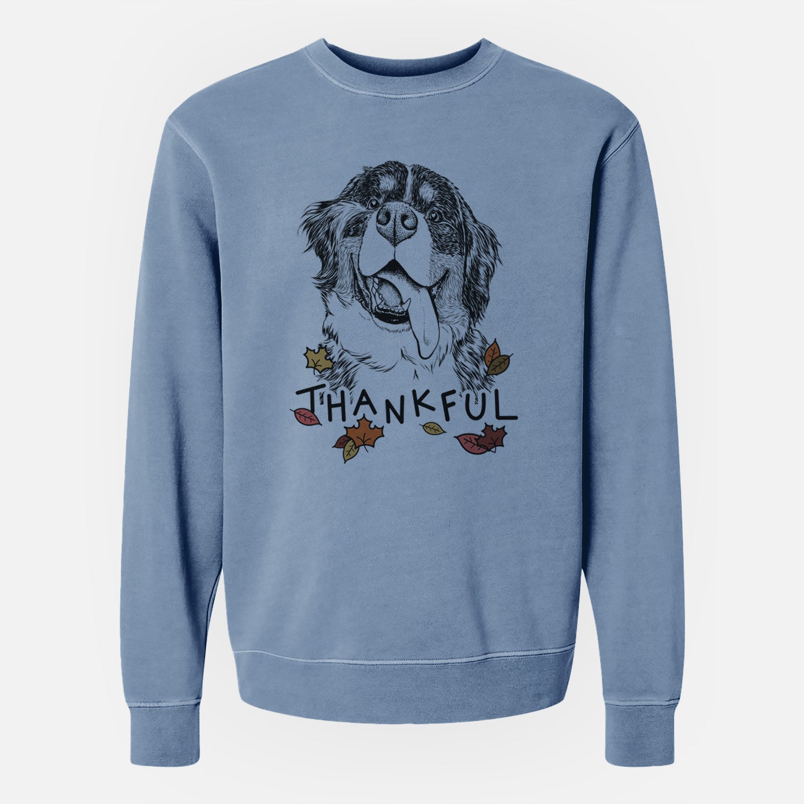 Hand-drawn sketch of Theo the Bernese Mountain Dog with 'Thankful' lettering and autumn leaves on a Slate Blue Unisex pigment dyed crew sweatshirt