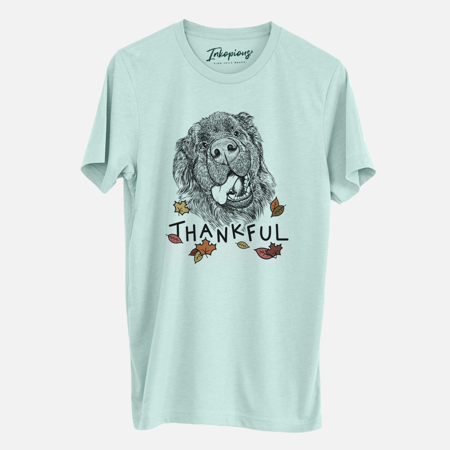 Hand-drawn sketch of Tuna the Newfoundland with 'Thankful' lettering and autumn leaves on a Heather Sage Unisex crewneck