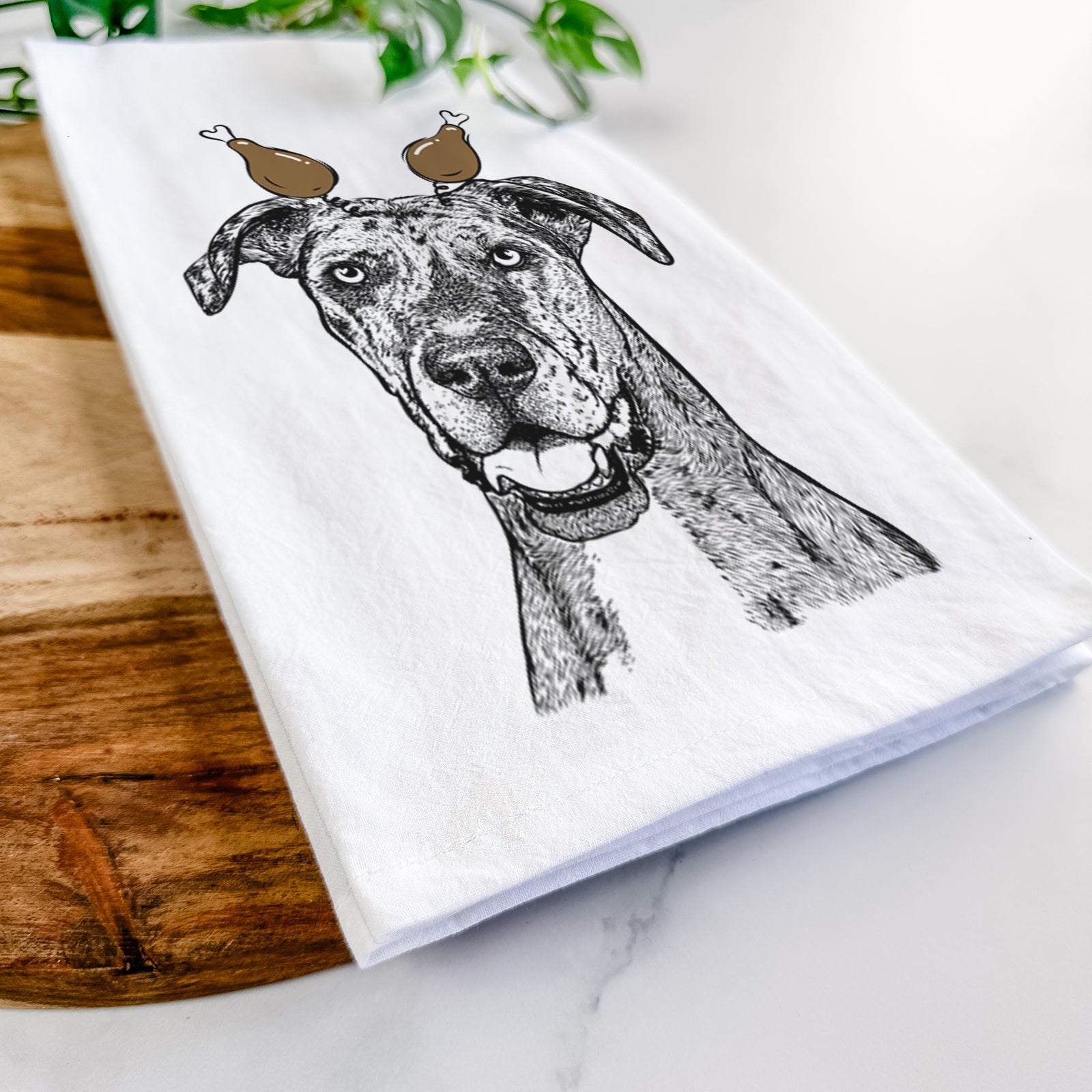 Hand-drawn sketch of Athena the Merle Great Dane with a Thanksgiving turkey headpiece on a tea towel