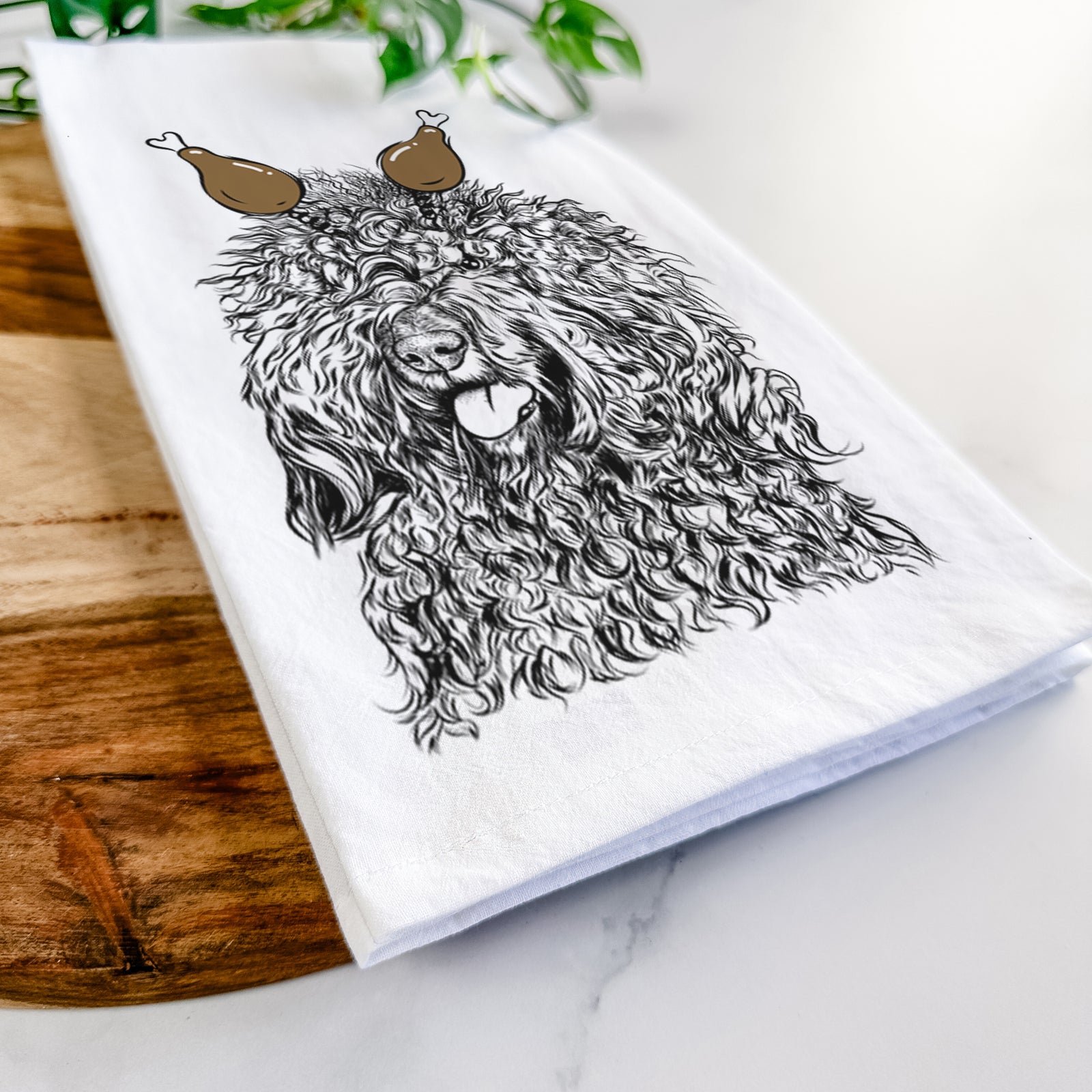Hand-drawn sketch of Babs the Barbet with a Thanksgiving turkey headpiece on a tea towel