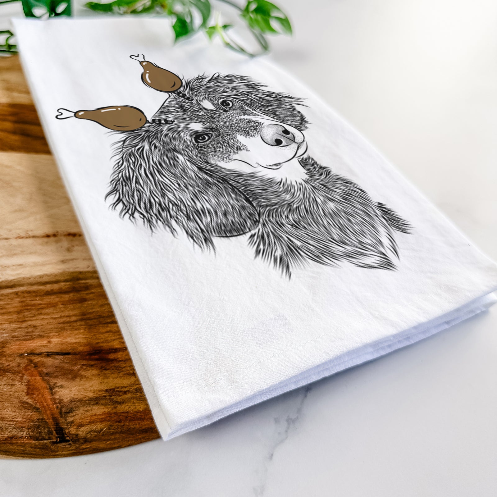 Hand-drawn sketch of Bailey the Long Haired Dachshund with a Thanksgiving turkey headpiece on a tea towel