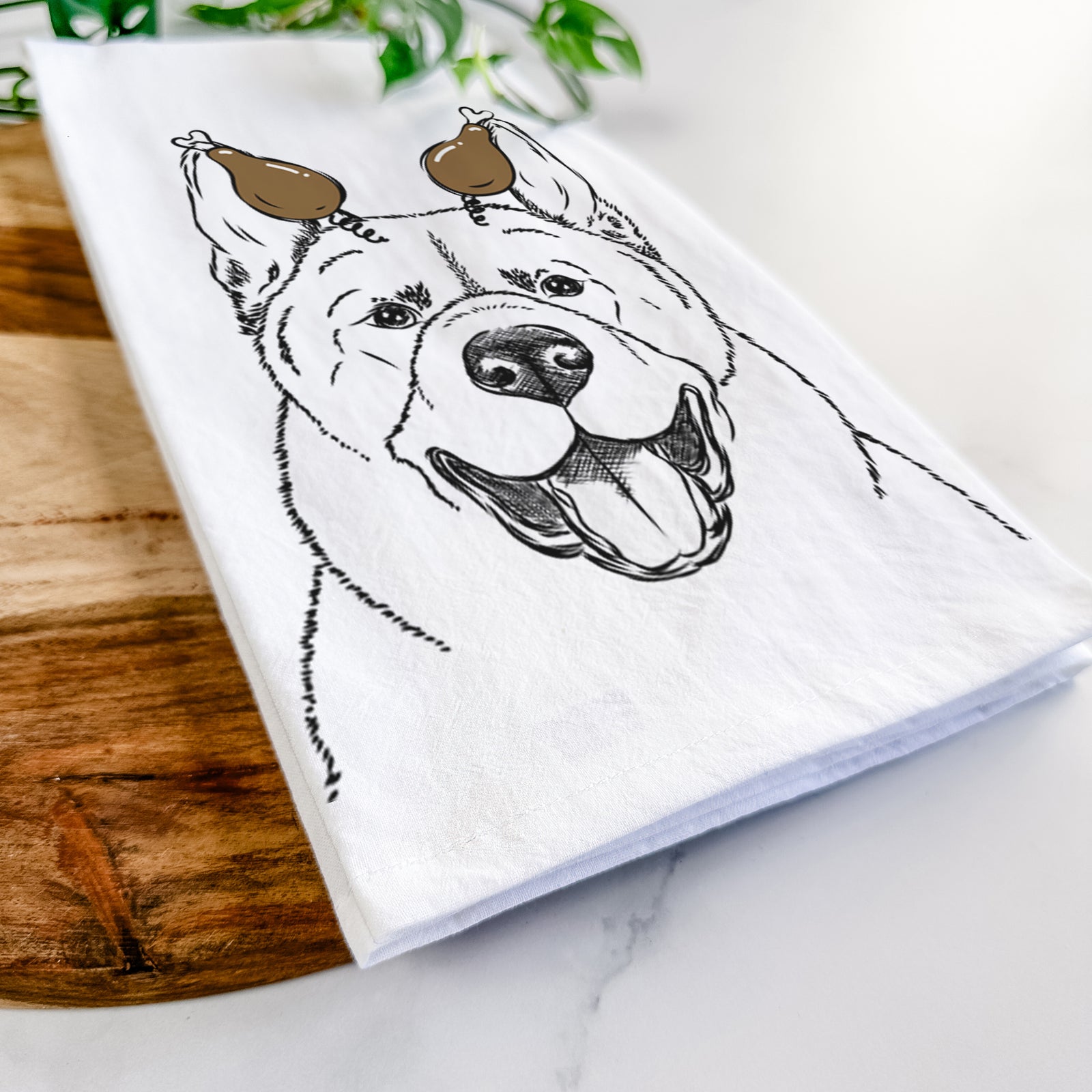 Hand-drawn sketch of Baku the Akita with a Thanksgiving turkey headpiece on a tea towel