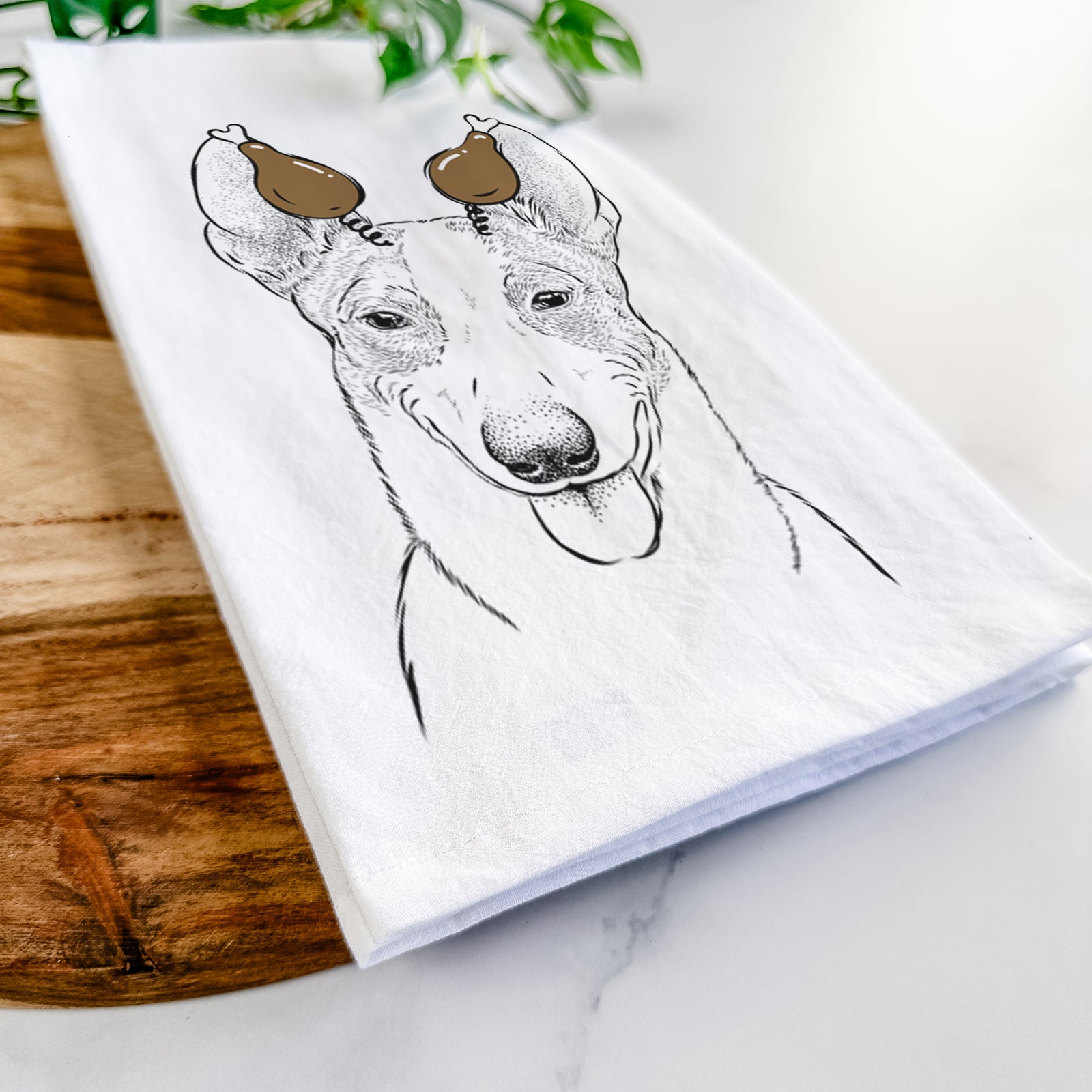 Hand-drawn sketch of Berlin the Carolina Dog with a Thanksgiving turkey headpiece on a tea towel