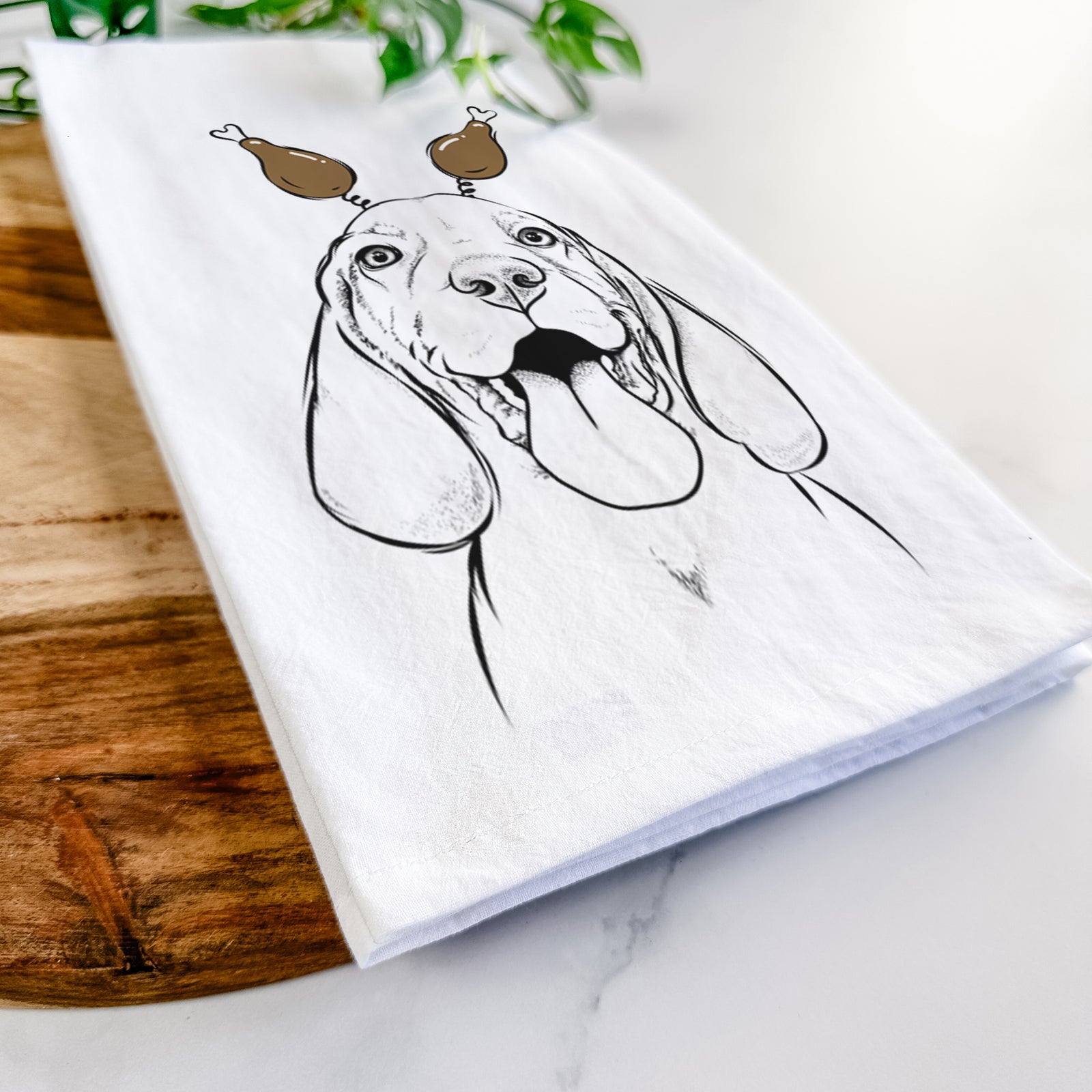 Hand-drawn sketch of Bodi the Vizsla with a Thanksgiving turkey headpiece on a tea towel