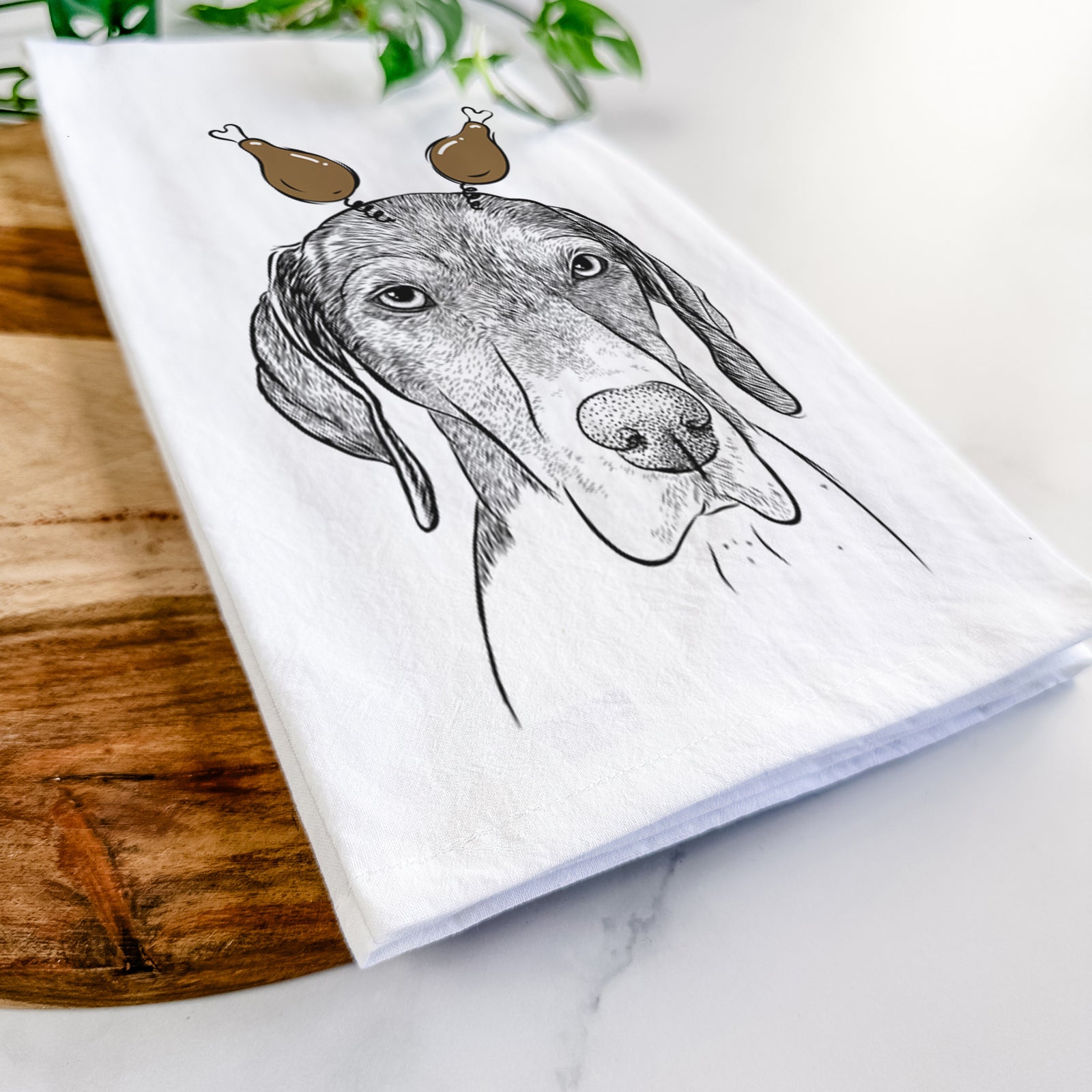 Hand-drawn sketch of Bohdi the German Shorthaired Pointer with a Thanksgiving turkey headpiece on a tea towel