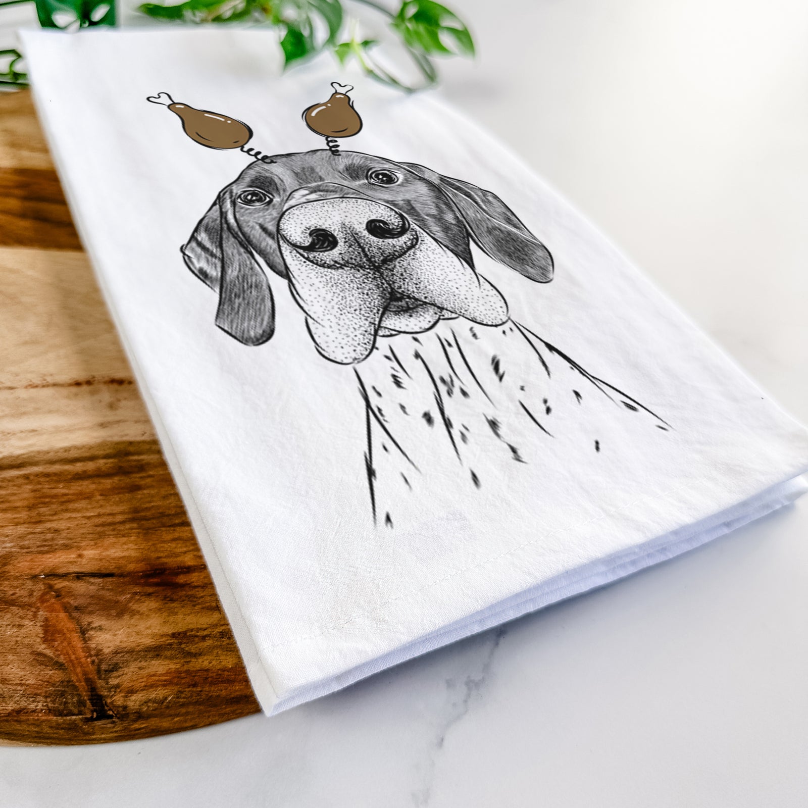 Hand-drawn sketch of Booze the German Shorthaired Pointer with a Thanksgiving turkey headpiece on a tea towel