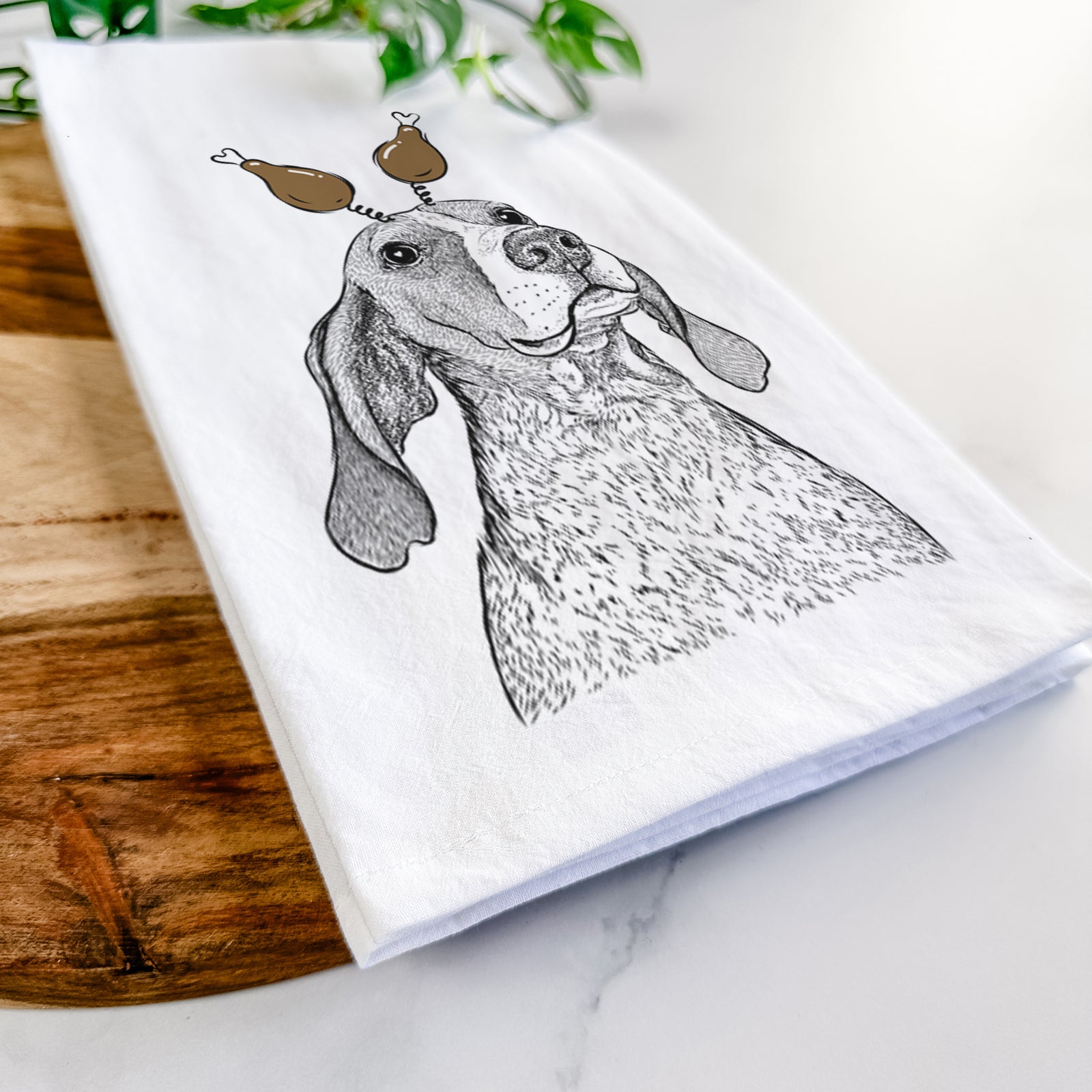 Hand-drawn sketch of Chester the Red Tick Coonhound with a Thanksgiving turkey headpiece on a tea towel