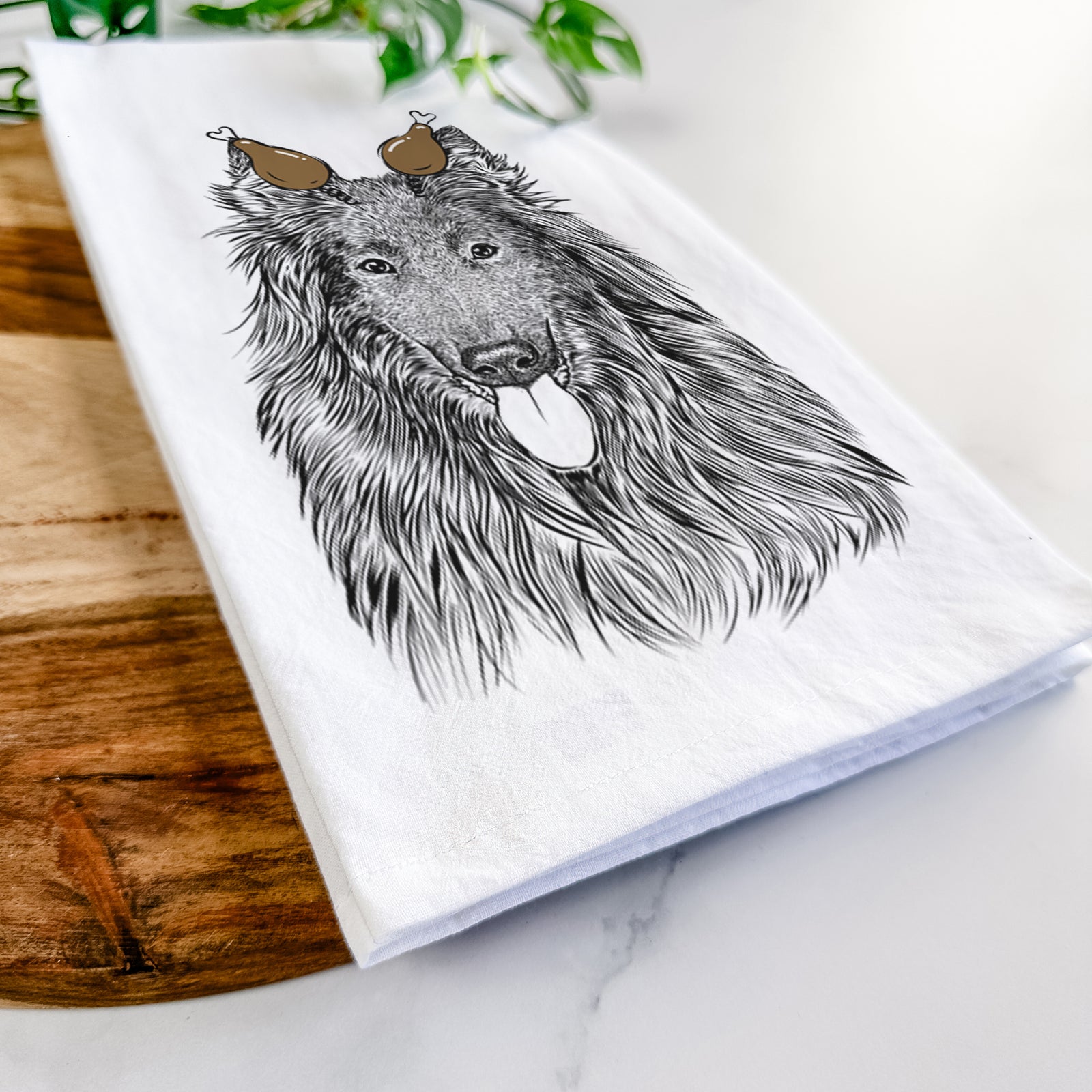 Hand-drawn sketch of Daan the Belgian Shepherd with a Thanksgiving turkey headpiece on a tea towel