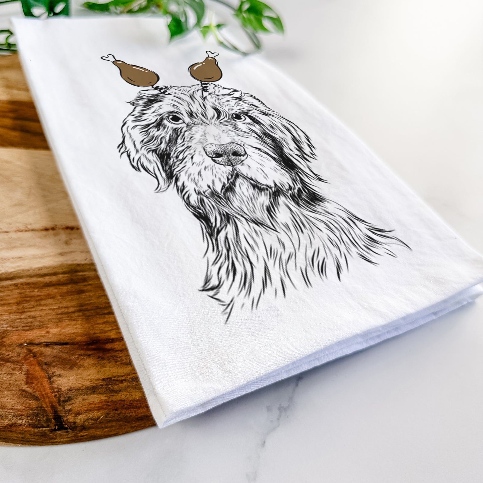 Hand-drawn sketch of Doc Holliday the Pudelpointer with a Thanksgiving turkey headpiece on a tea towel