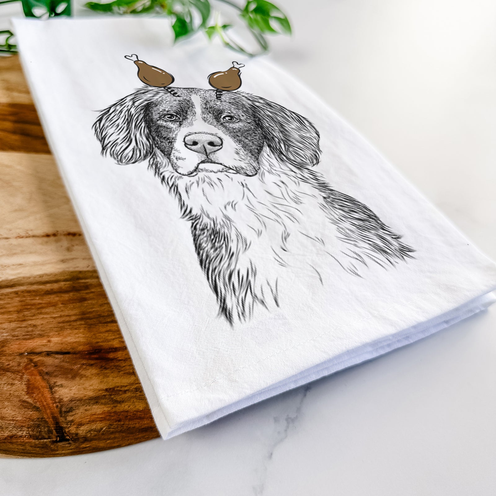 Hand-drawn sketch of Dulce the Drentsche Patrijshond with a Thanksgiving turkey headpiece on a tea towel