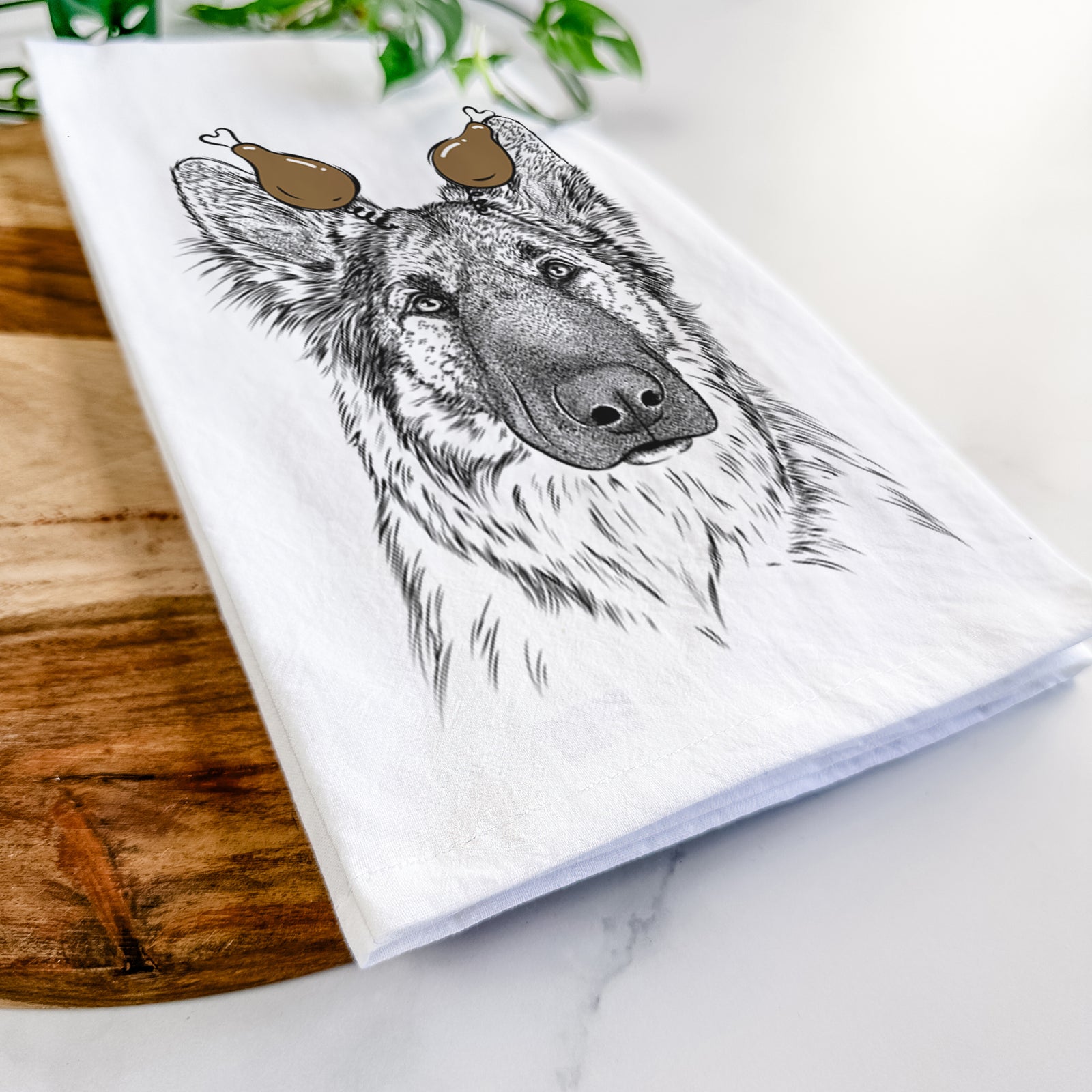 Hand-drawn sketch of Geddy the Shiloh Shepherd with a Thanksgiving turkey headpiece on a tea towel