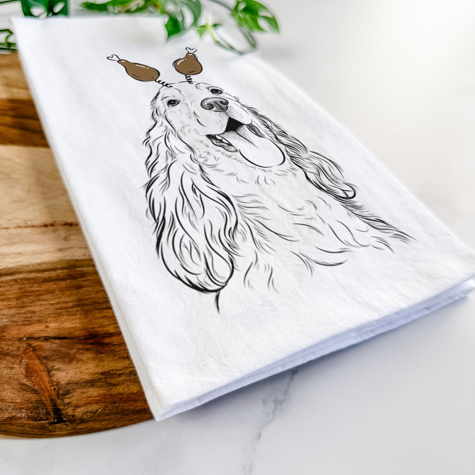 Hand-drawn sketch of Happy Henry the English Cocker Spaniel with a Thanksgiving turkey headpiece on a tea towel