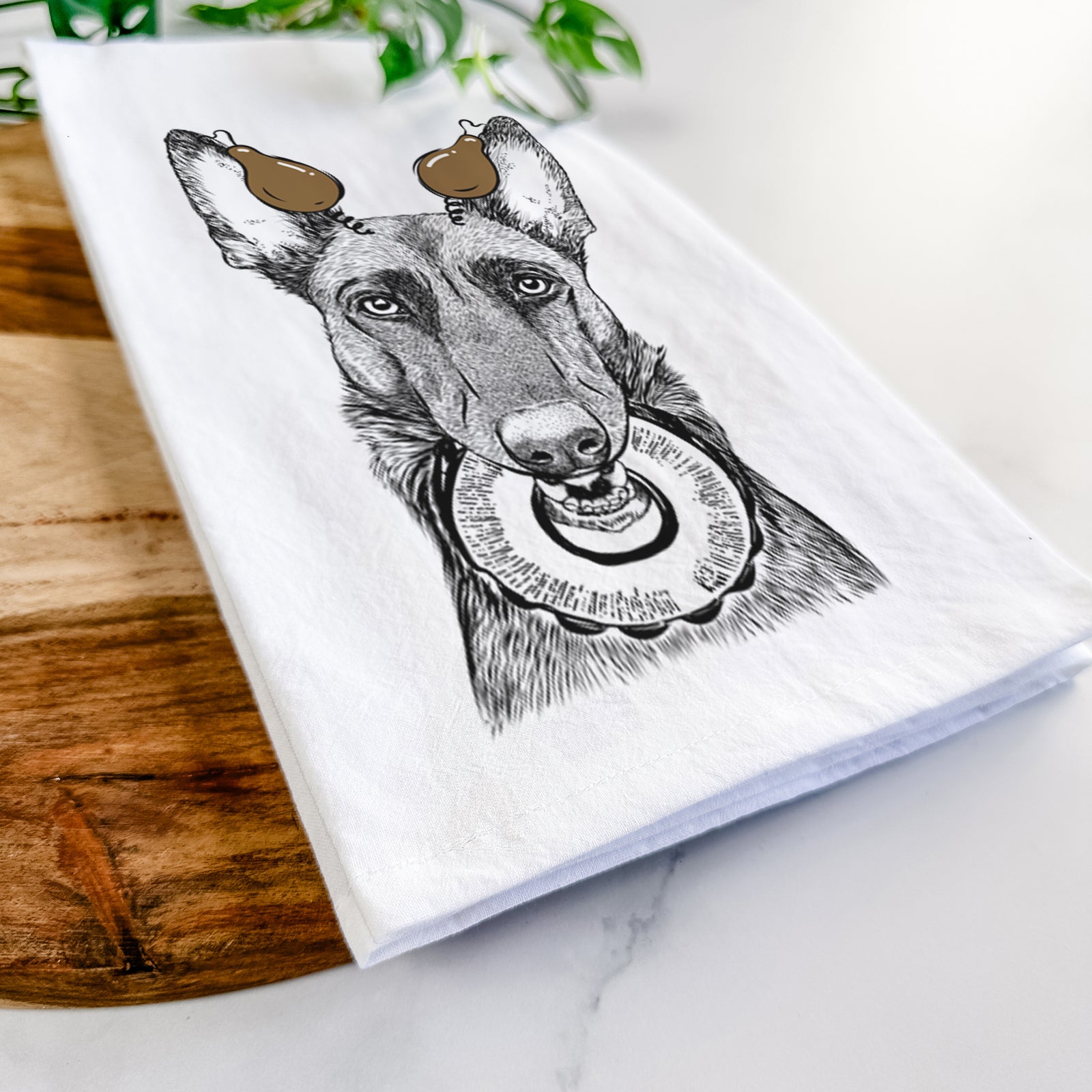 Hand-drawn sketch of Juno the Belgian Malinois with a Thanksgiving turkey headpiece on a tea towel