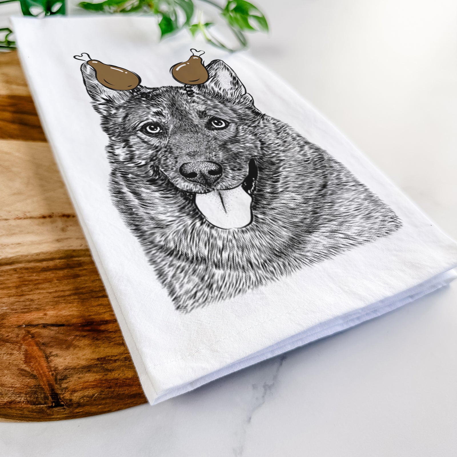 Hand-drawn sketch of Kasia the Norwegian Elkhound with a Thanksgiving turkey headpiece on a tea towel