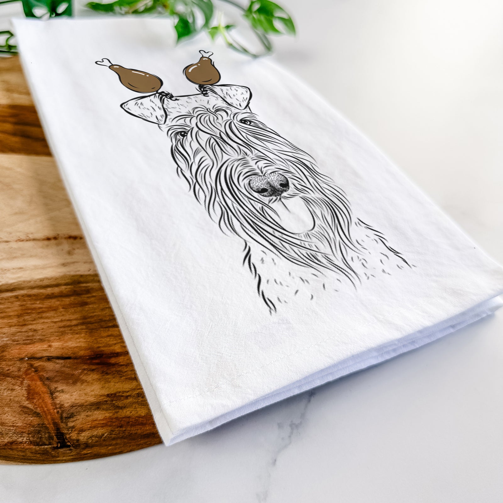 Hand-drawn sketch of Kricket the Kerry Blue Terrier with a Thanksgiving turkey headpiece on a tea towel