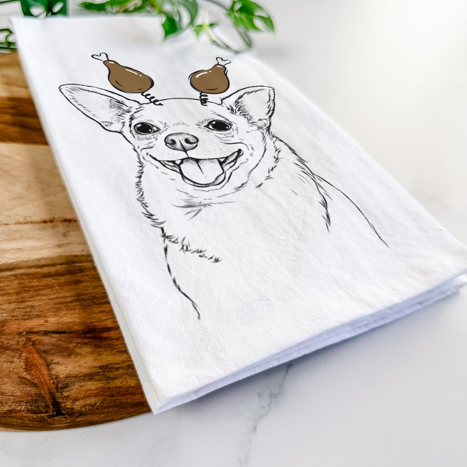 Hand-drawn sketch of Maddison Pearl the Chihuahua with a Thanksgiving turkey headpiece on a tea towel
