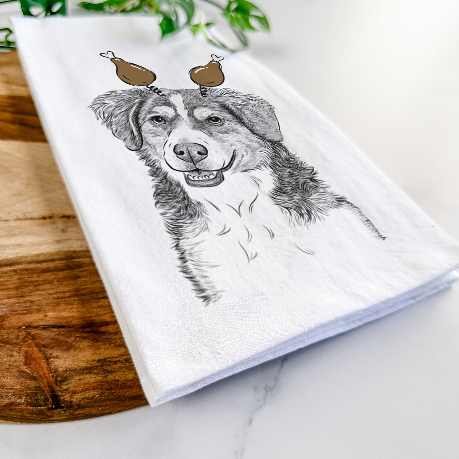 Hand-drawn sketch of Molly the Miniature Bernedoodle with a Thanksgiving turkey headpiece on a tea towel
