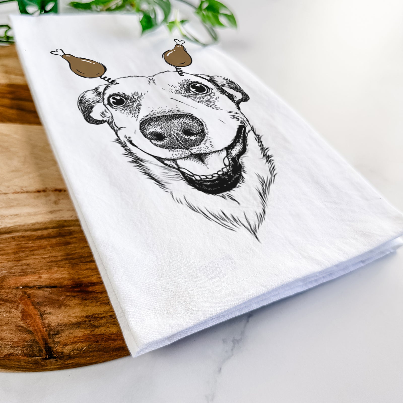 Hand-drawn sketch of Petrah the Staffy Mix with a Thanksgiving turkey headpiece on a tea towel