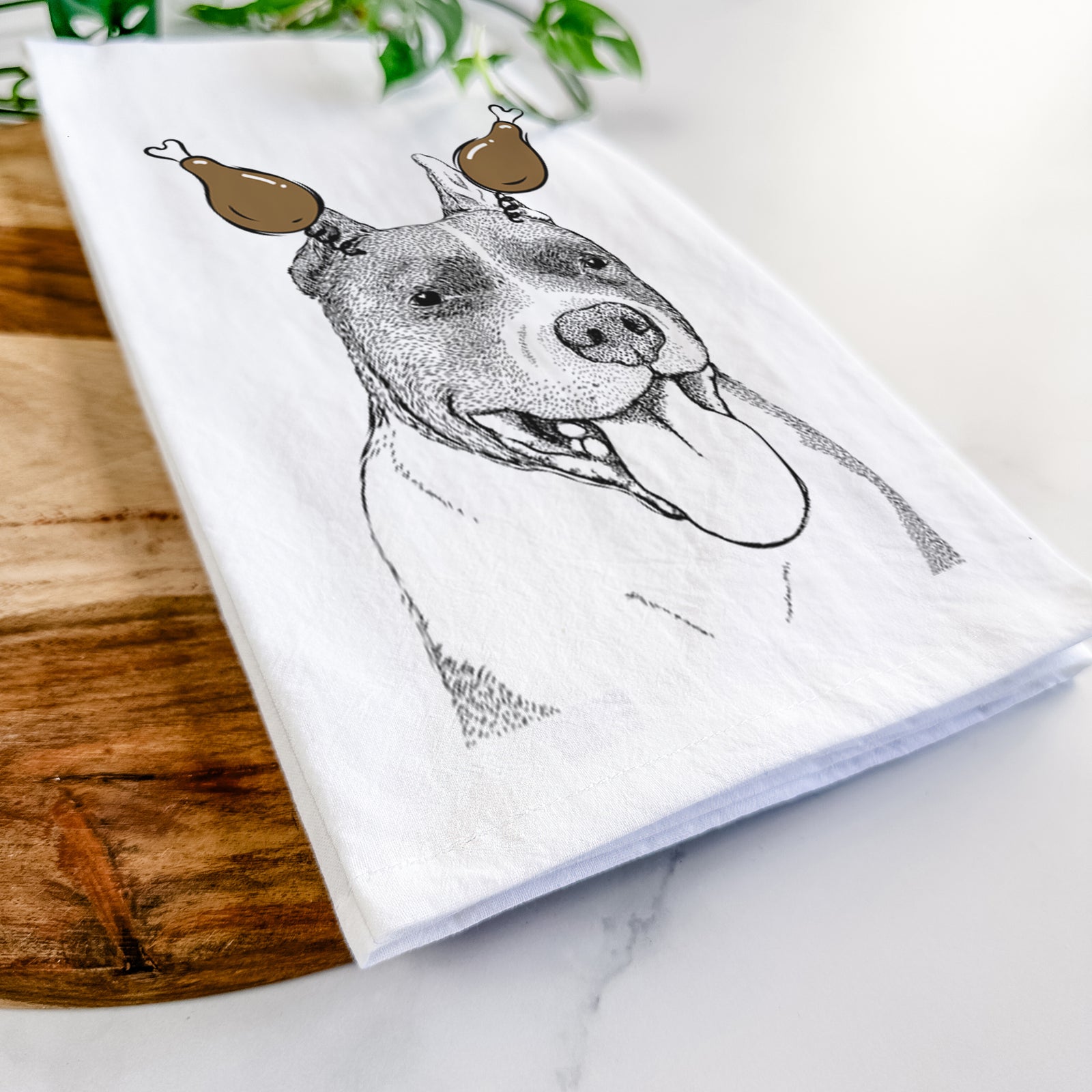 Hand-drawn sketch of Piggy the American Staffordshire Terrier with a Thanksgiving turkey headpiece on a tea towel
