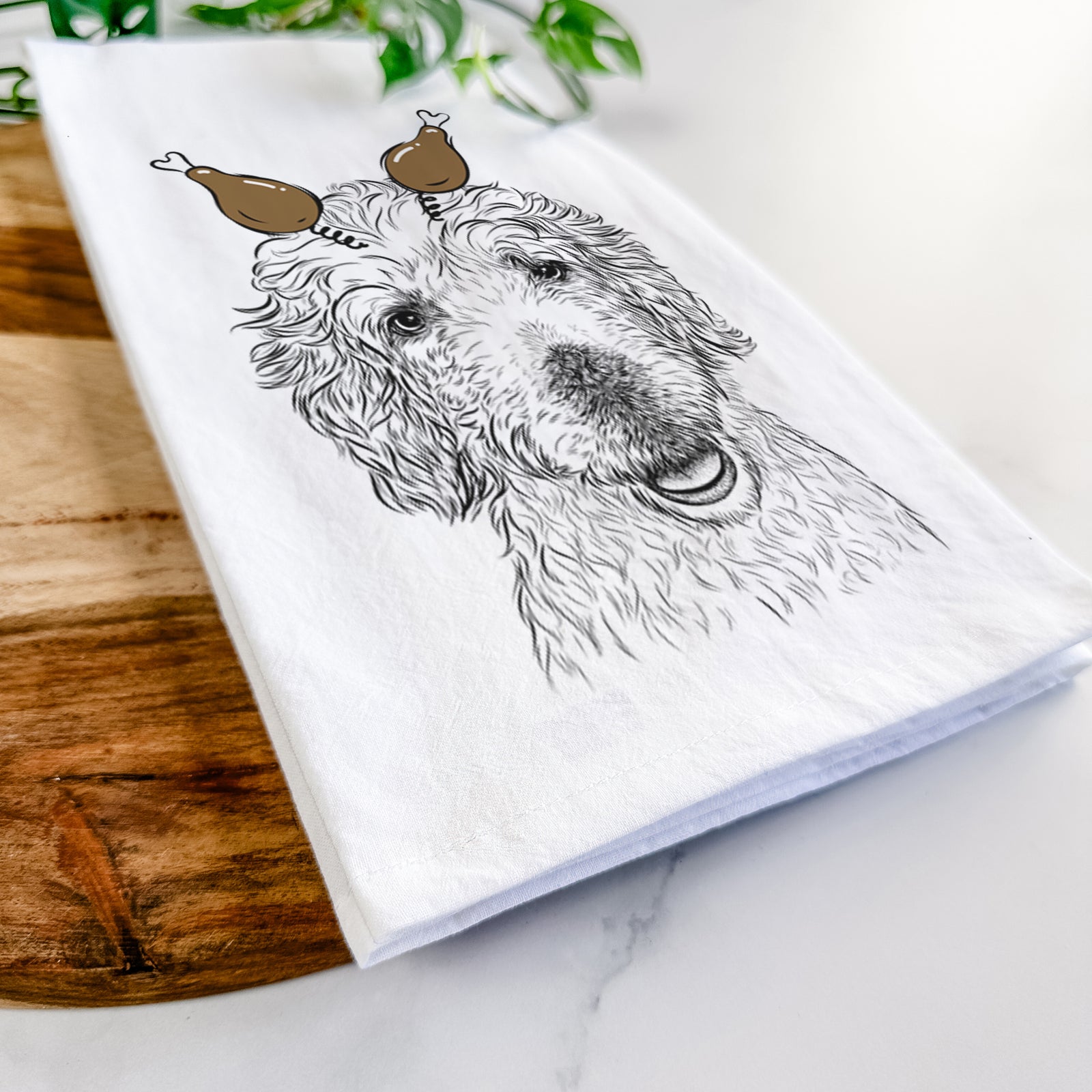 Hand-drawn sketch of Preston the Labradoodle with a Thanksgiving turkey headpiece on a tea towel