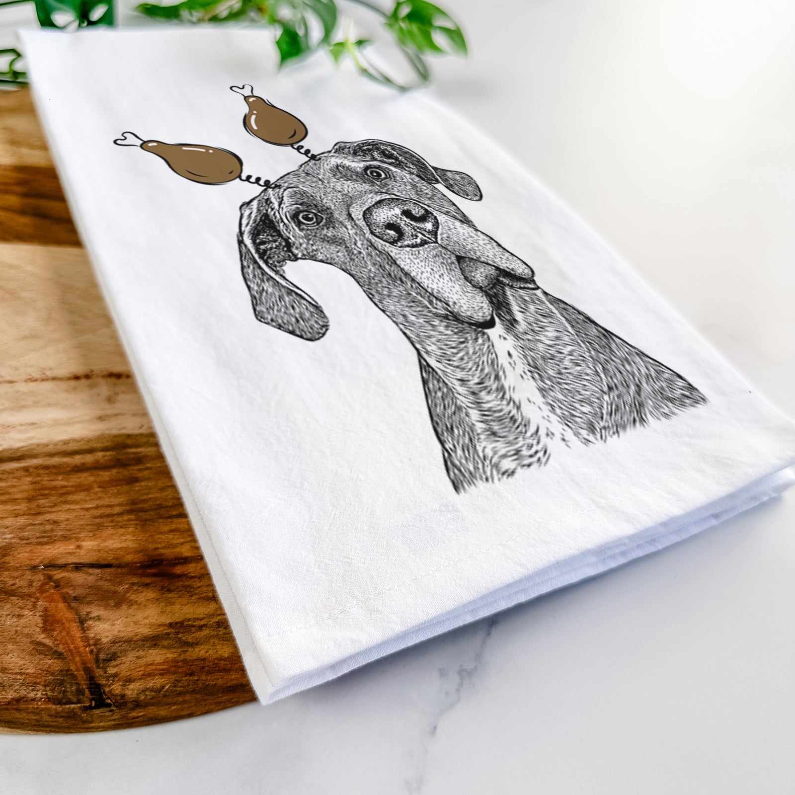 Hand-drawn sketch of River the Great Dane with a Thanksgiving turkey headpiece on a tea towel