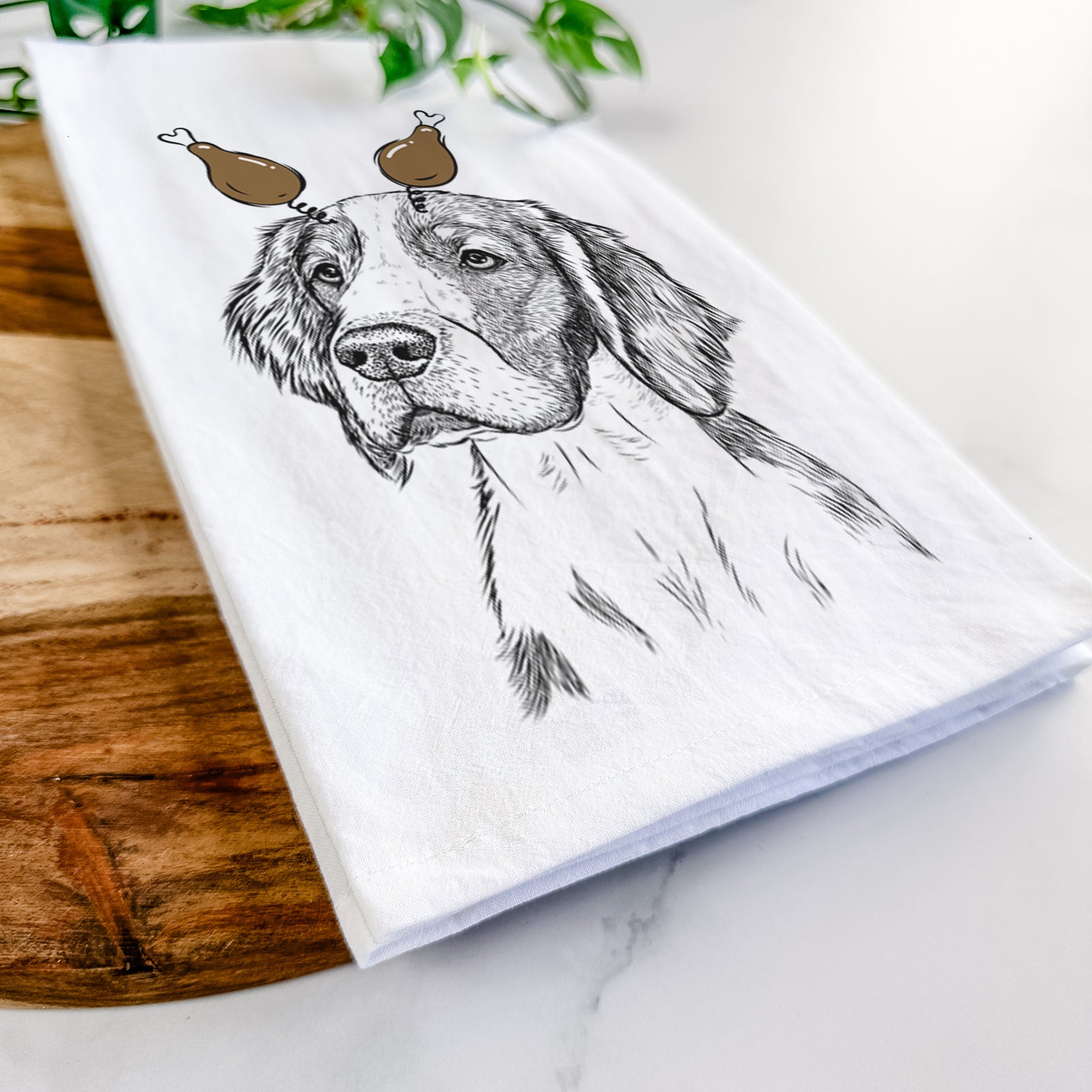 Hand-drawn sketch of Roxy the Welsh Springer Spaniel with a Thanksgiving turkey headpiece on a tea towel