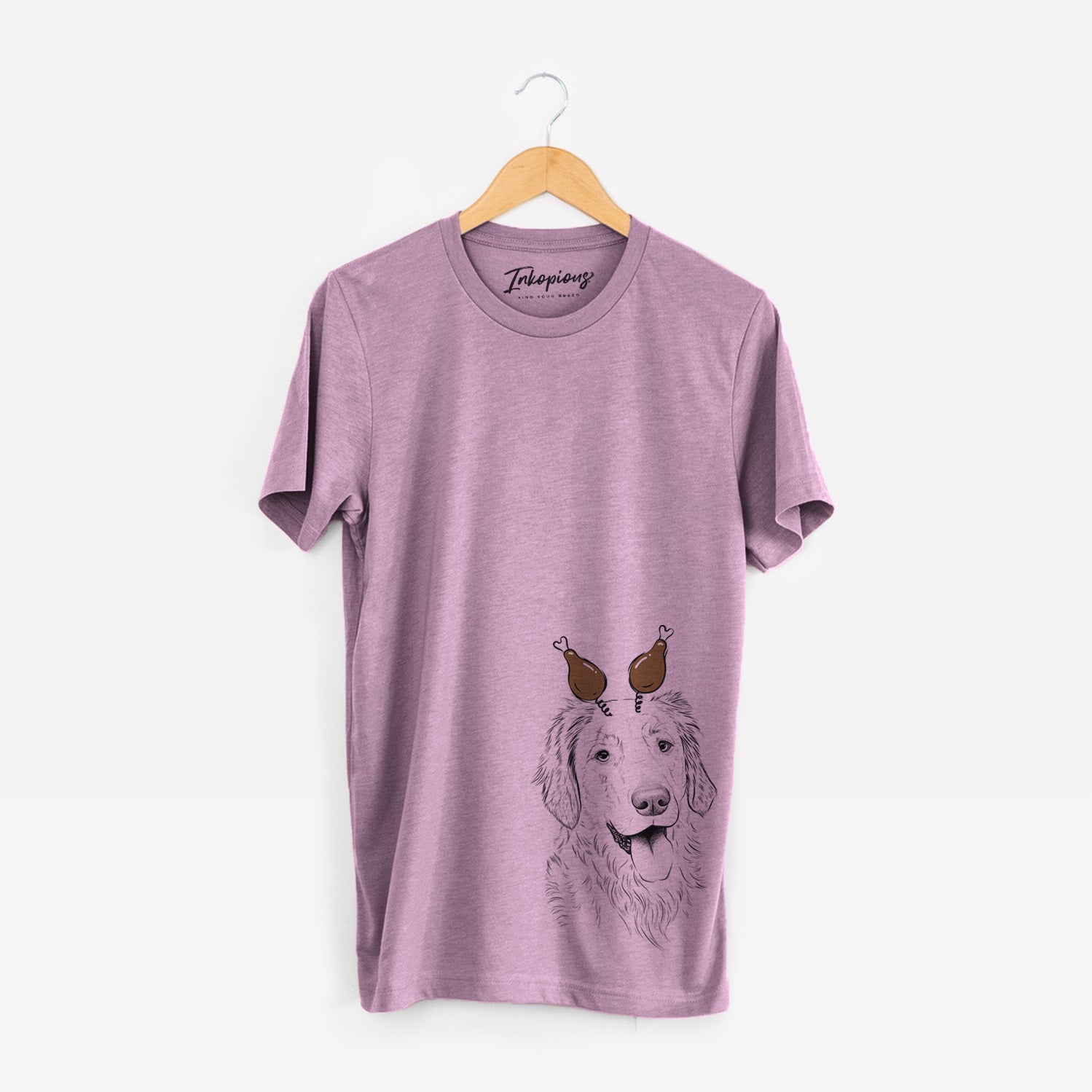 Hand-drawn sketch of Semba the Golden Retriever with a Thanksgiving turkey headpiece on an Orchid Unisex crewneck