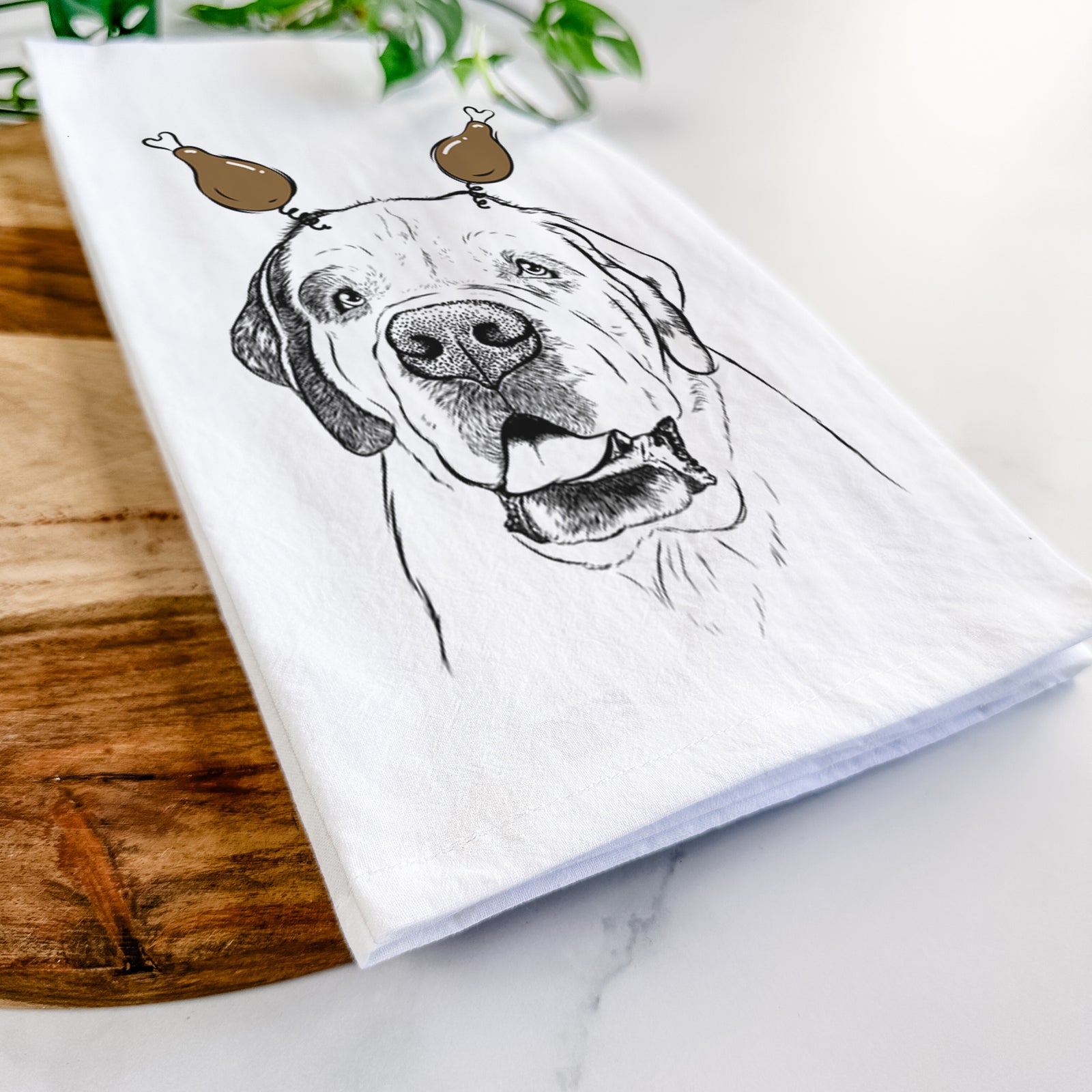 Hand-drawn sketch of Wendy the Saint Bernard with a Thanksgiving turkey headpiece on a tea towel