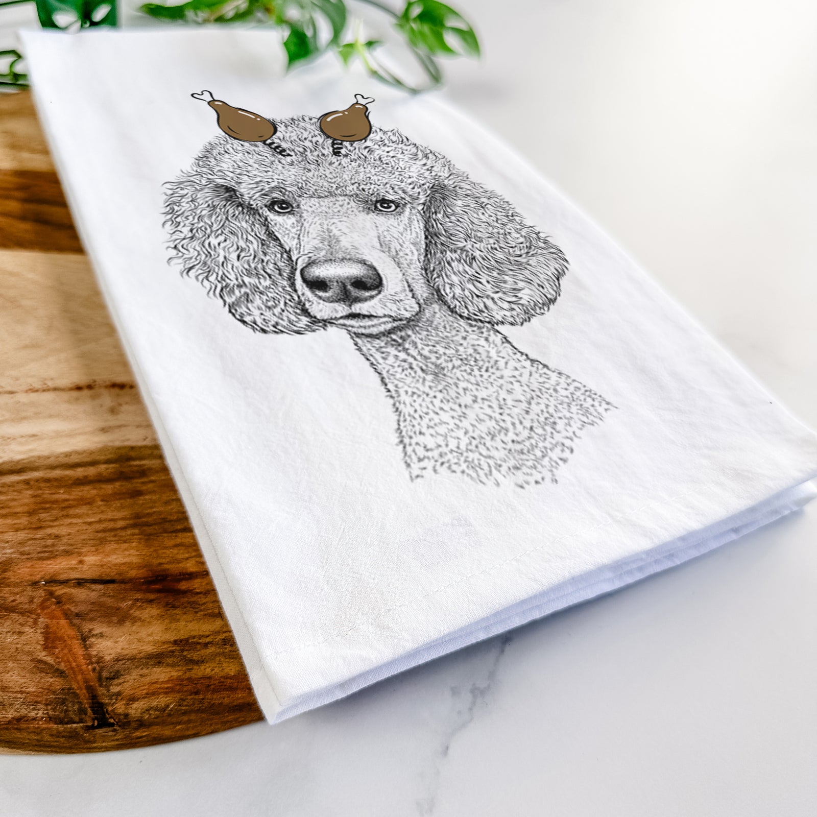 Hand-drawn sketch of Yuki the Poodle with a Thanksgiving turkey headpiece on a tea towel