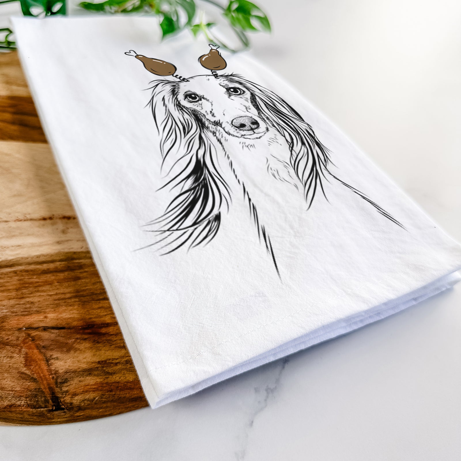 Hand-drawn sketch of Zahra the Saluki with a Thanksgiving turkey headpiece on a tea towel