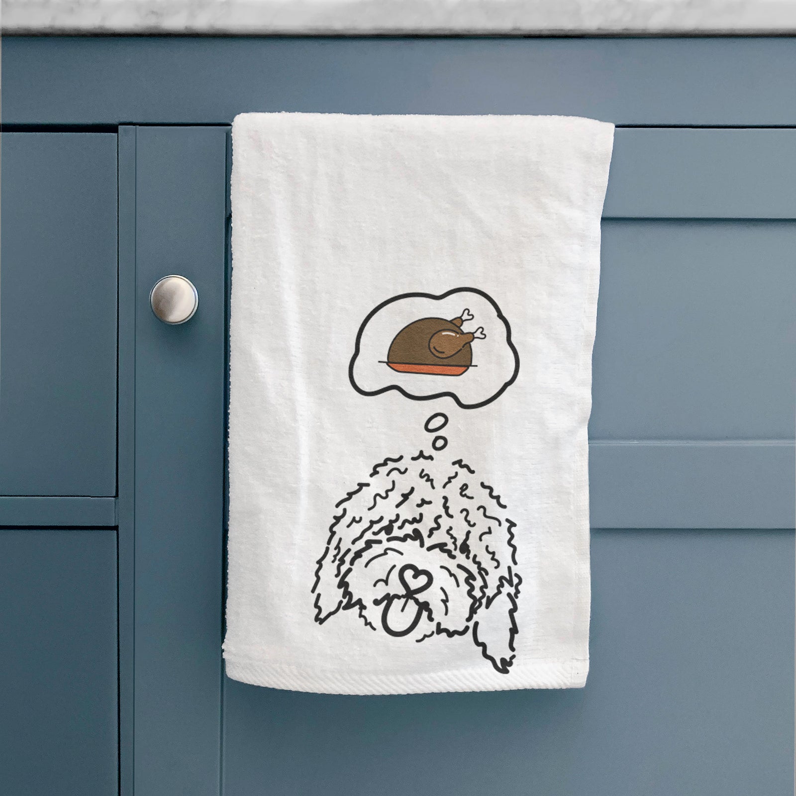 Minimalist line drawing of Antonio the Spanish Water Dog with a little turkey on a decorative hand towel