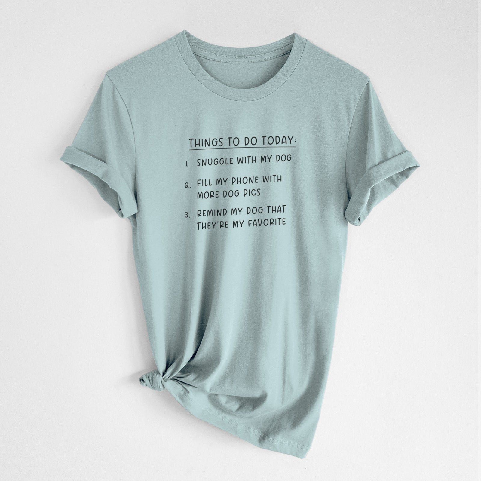 'Things to Do Today - Snuggle with Dog' design on a Dusty Blue Unisex crewneck, worn by a woman