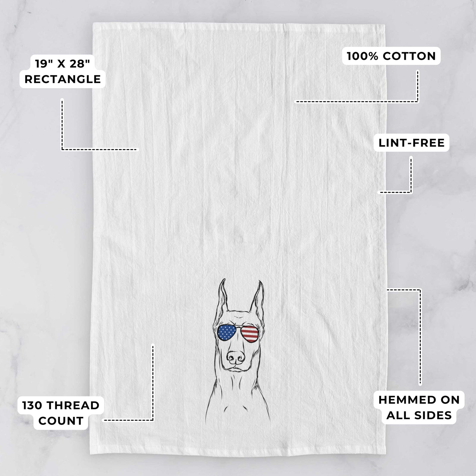 Hand-drawn sketch of Ace the Doberman Pinscher wearing American flag sunglasses on a tea towel, with feature callouts: 19 x 28 inch rectangle, 100% cotton, lint-free, 120 thread count, hemmed on all sides