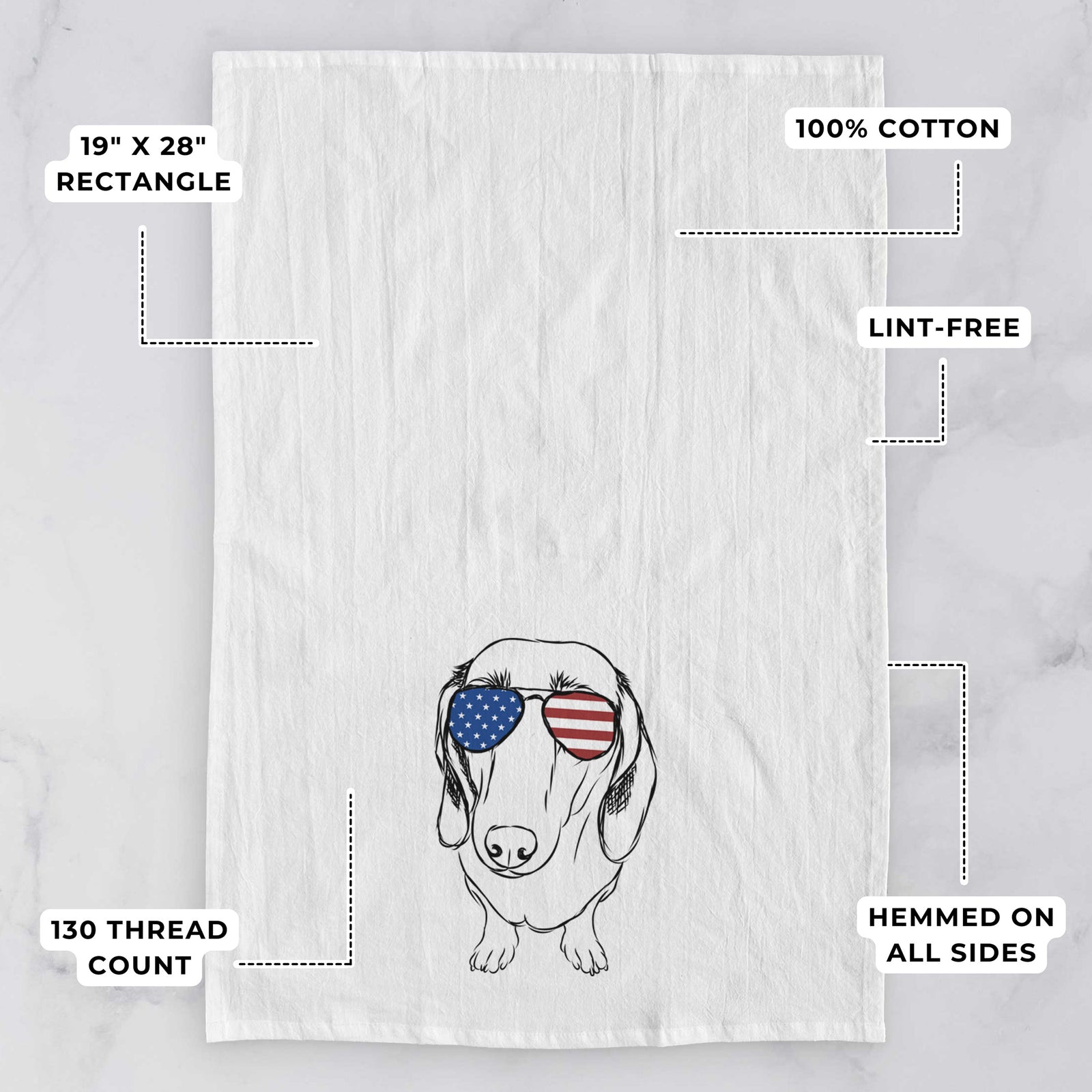Hand-drawn sketch of Annabelle the Dachshund wearing American flag sunglasses on a tea towel, with feature callouts: 19 x 28 inch rectangle, 100% cotton, lint-free, 120 thread count, hemmed on all sides