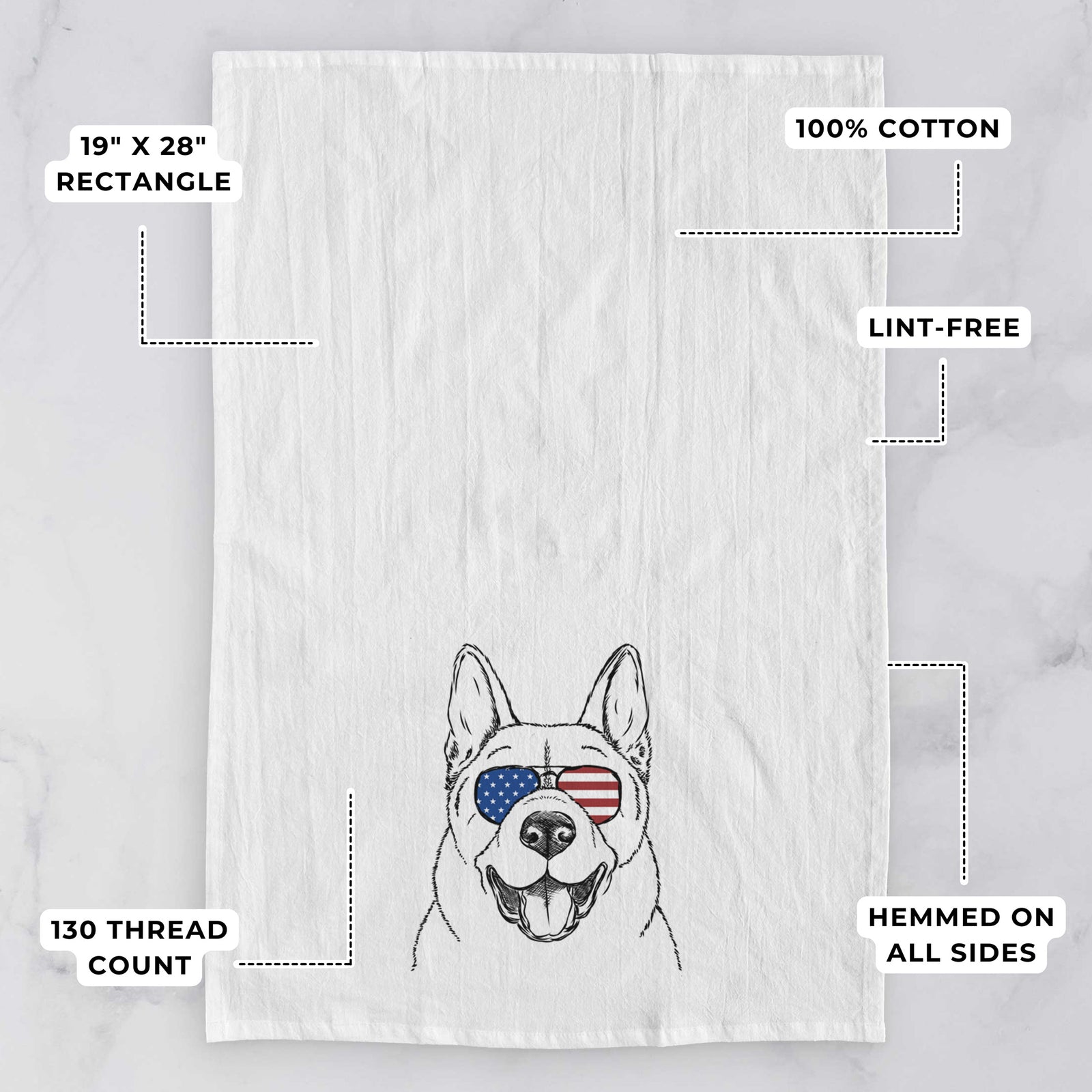 Hand-drawn sketch of Baku the Akita wearing American flag sunglasses on a tea towel, with feature callouts: 19 x 28 inch rectangle, 100% cotton, lint-free, 120 thread count, hemmed on all sides