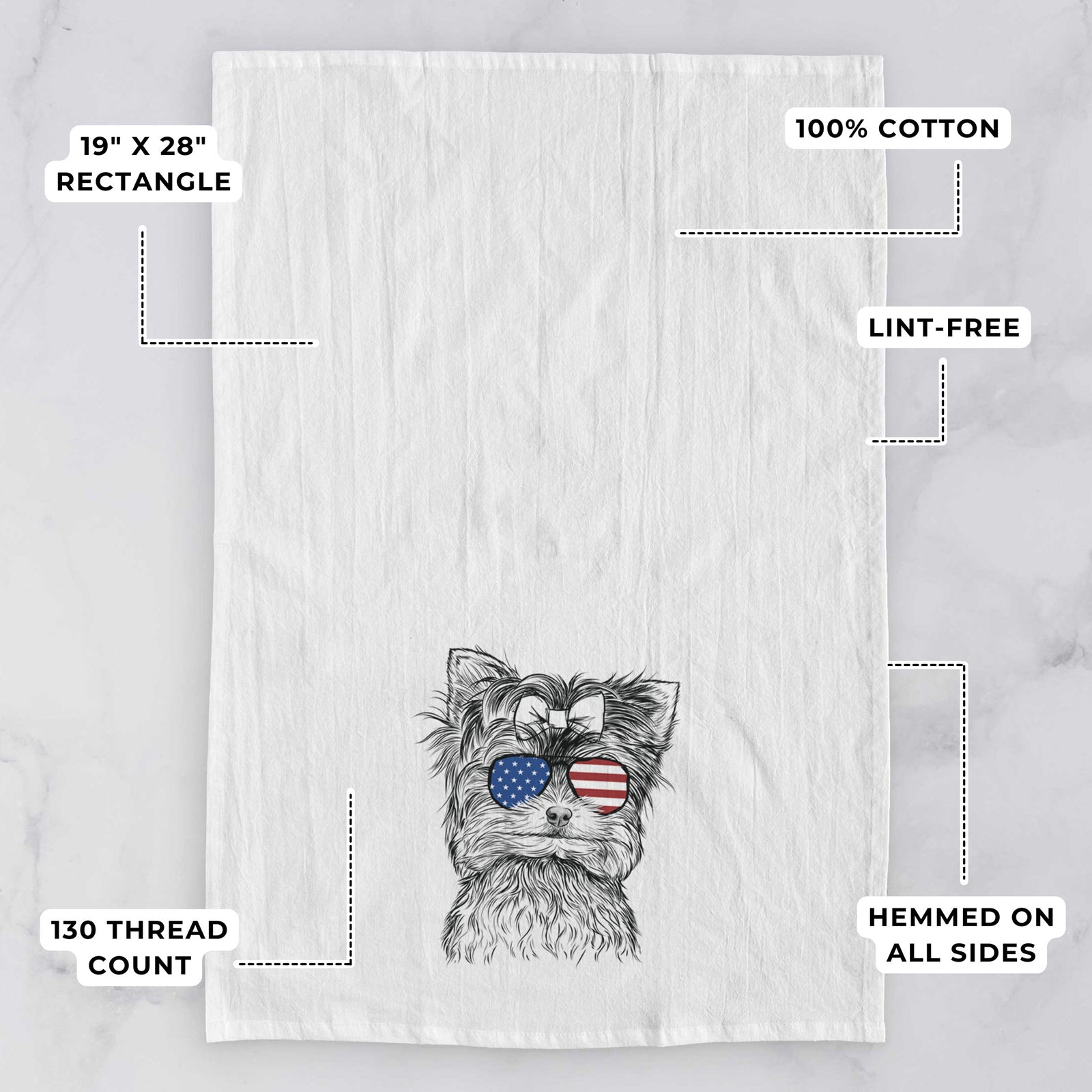 Hand-drawn sketch of Cricket the Biewer Terrier wearing American flag sunglasses on a tea towel, with feature callouts: 19 x 28 inch rectangle, 100% cotton, lint-free, 120 thread count, hemmed on all sides