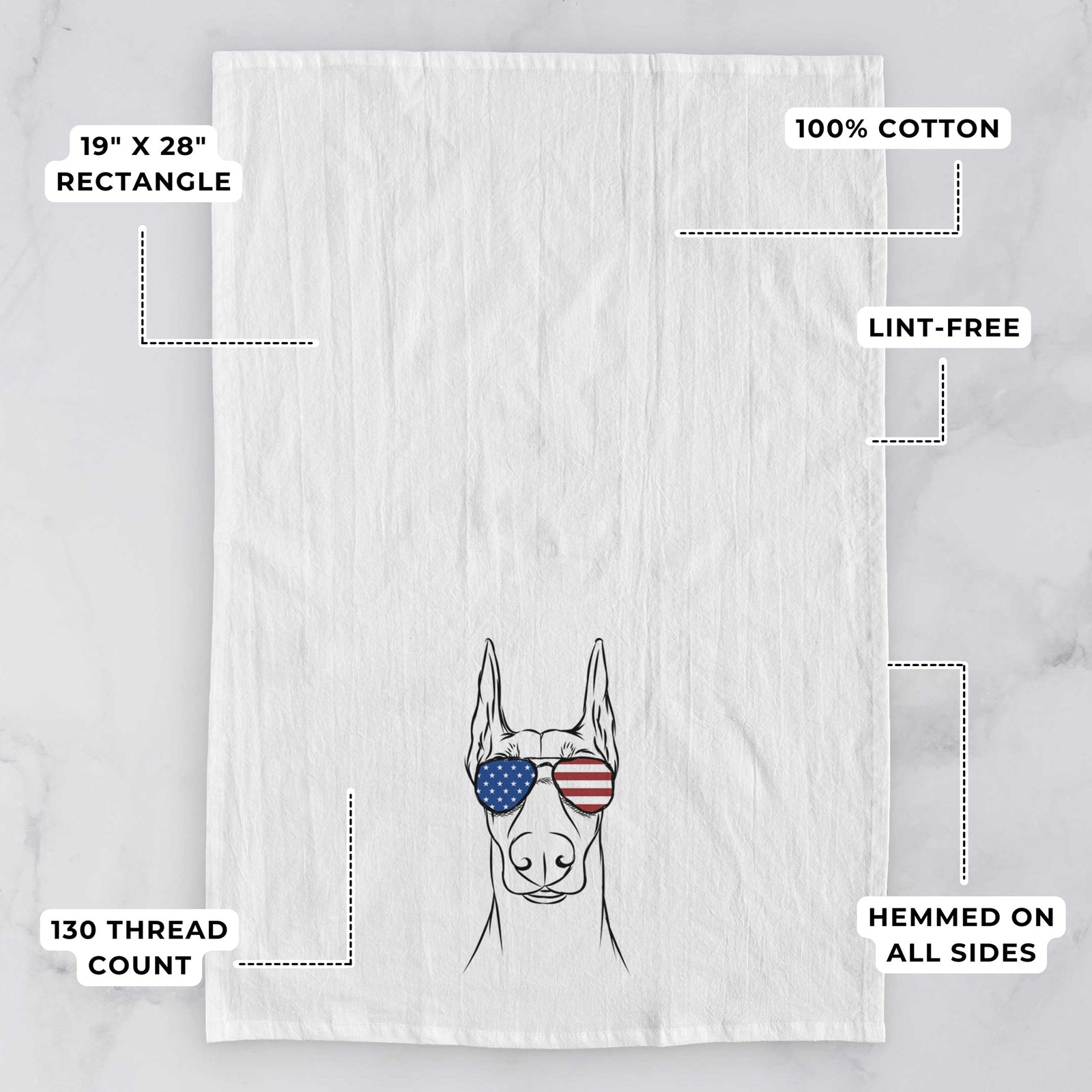 Hand-drawn sketch of Duke the Doberman Pinscher wearing American flag sunglasses on a tea towel, with feature callouts: 19 x 28 inch rectangle, 100% cotton, lint-free, 120 thread count, hemmed on all sides