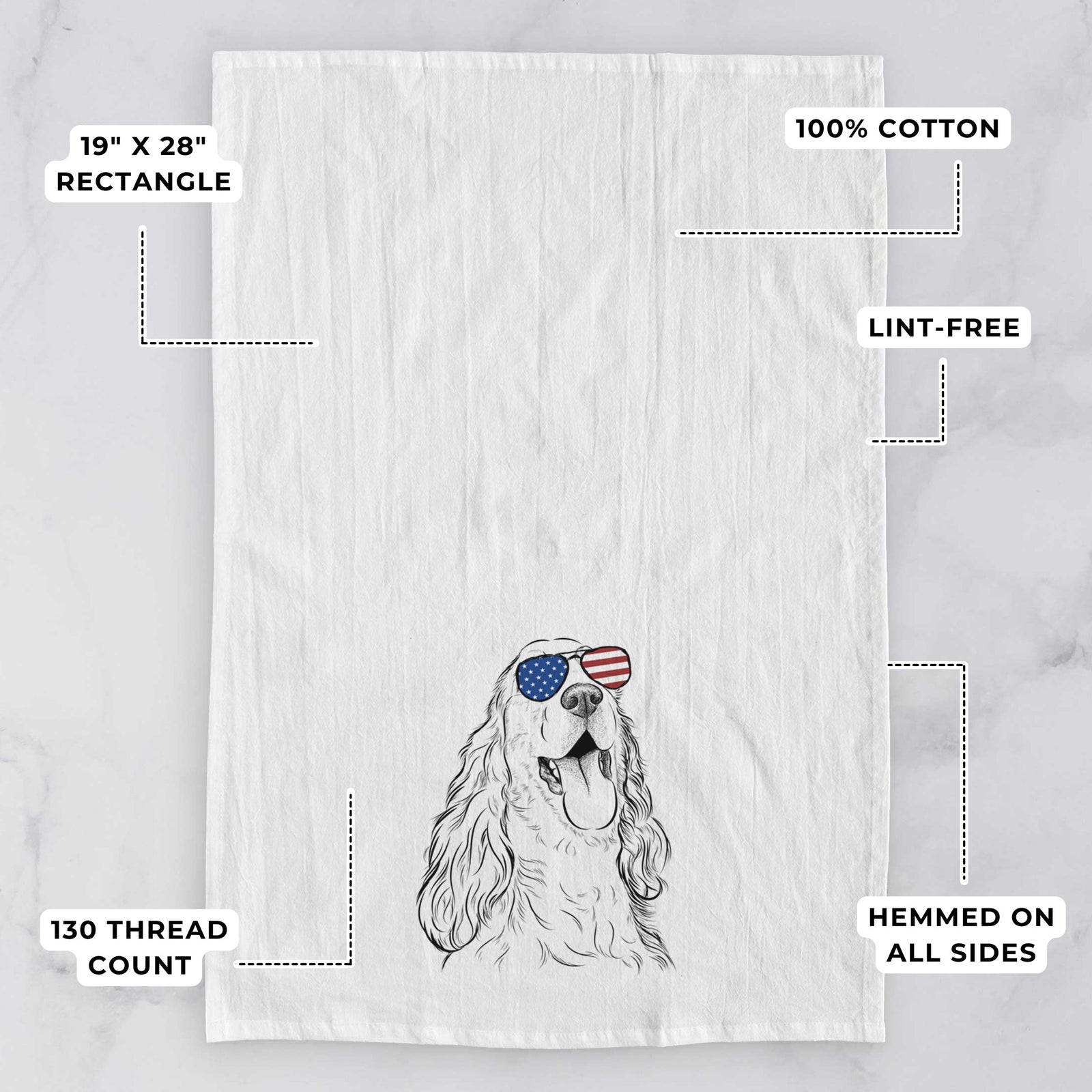 Hand-drawn sketch of Happy Henry the English Cocker Spaniel wearing American flag sunglasses on a tea towel, with feature callouts: 19 x 28 inch rectangle, 100% cotton, lint-free, 120 thread count, hemmed on all sides